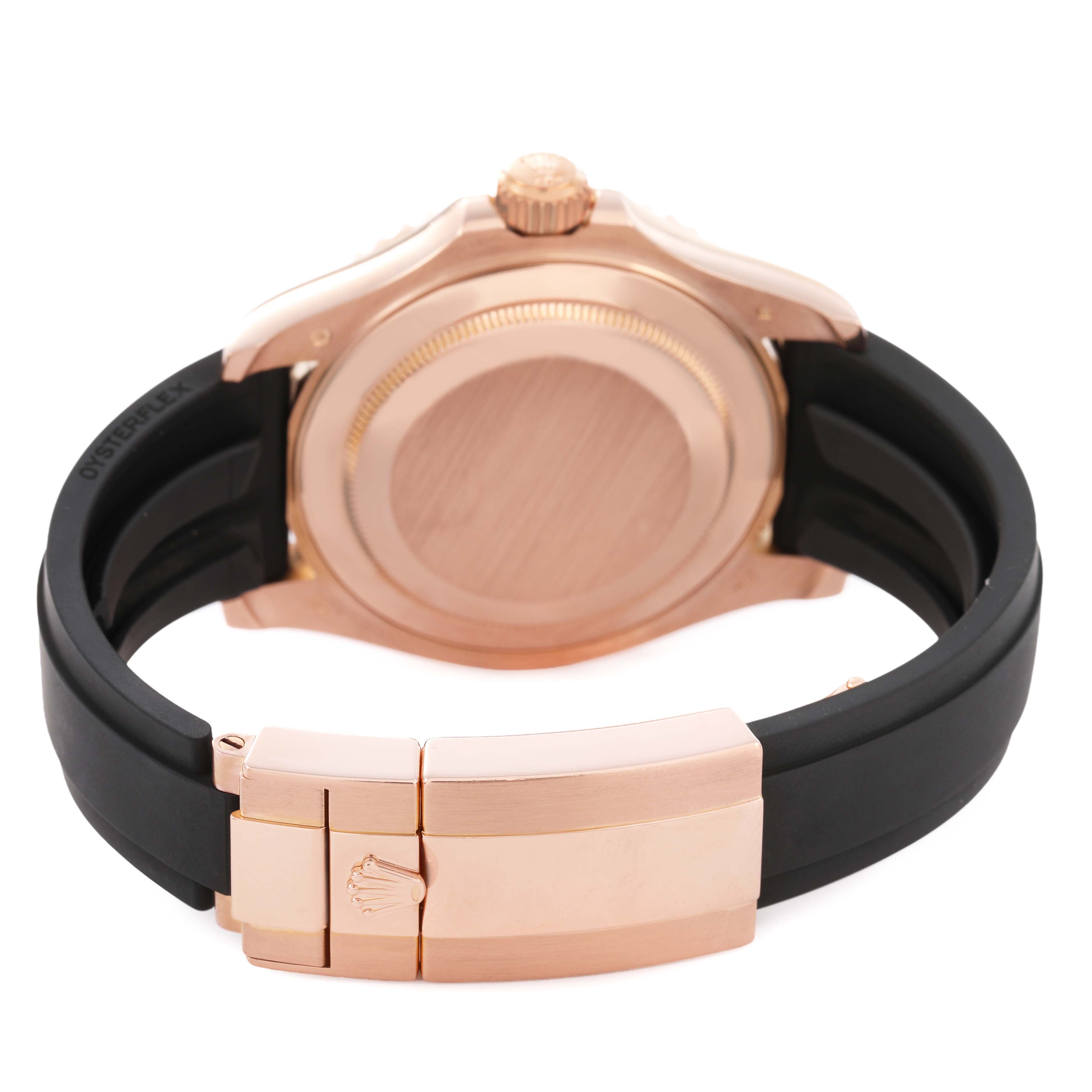 The image shows the back case and clasp of a Rolex Yacht-Master 116655 Men's Rose Gold Black Dial watch at an angle.