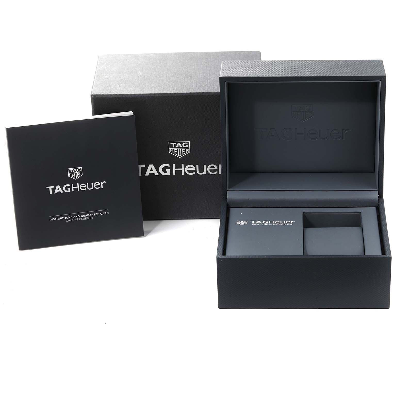 The image shows the packaging and instruction manual for the Tag Heuer Aquaracer WAY201F Men's Stainless Steel Black Dial WAY201F Men's Stainless Steel Black Dial model watch.