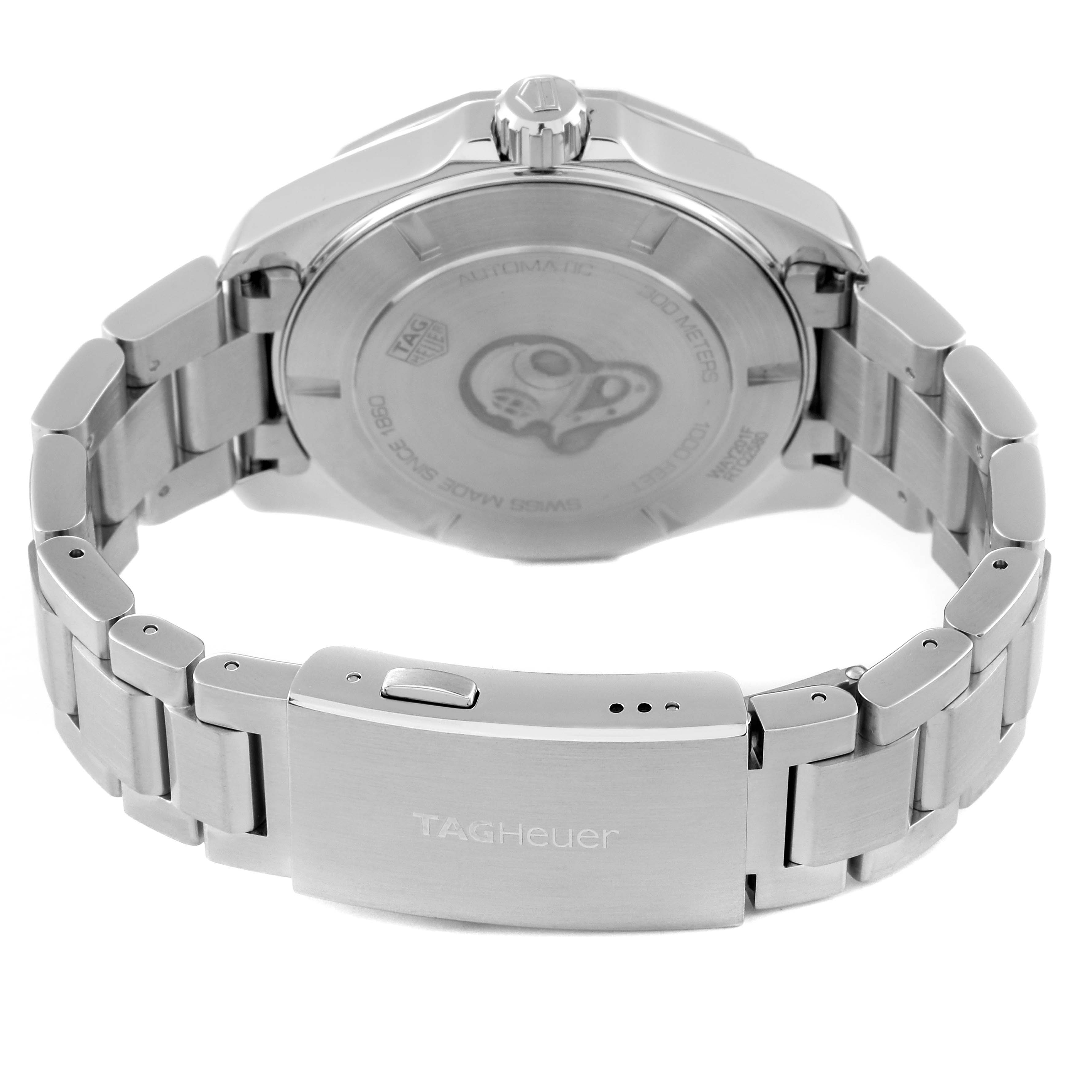 The image shows the back view of the Aquaracer model by Tag Heuer, featuring its case back, crown, and clasp.