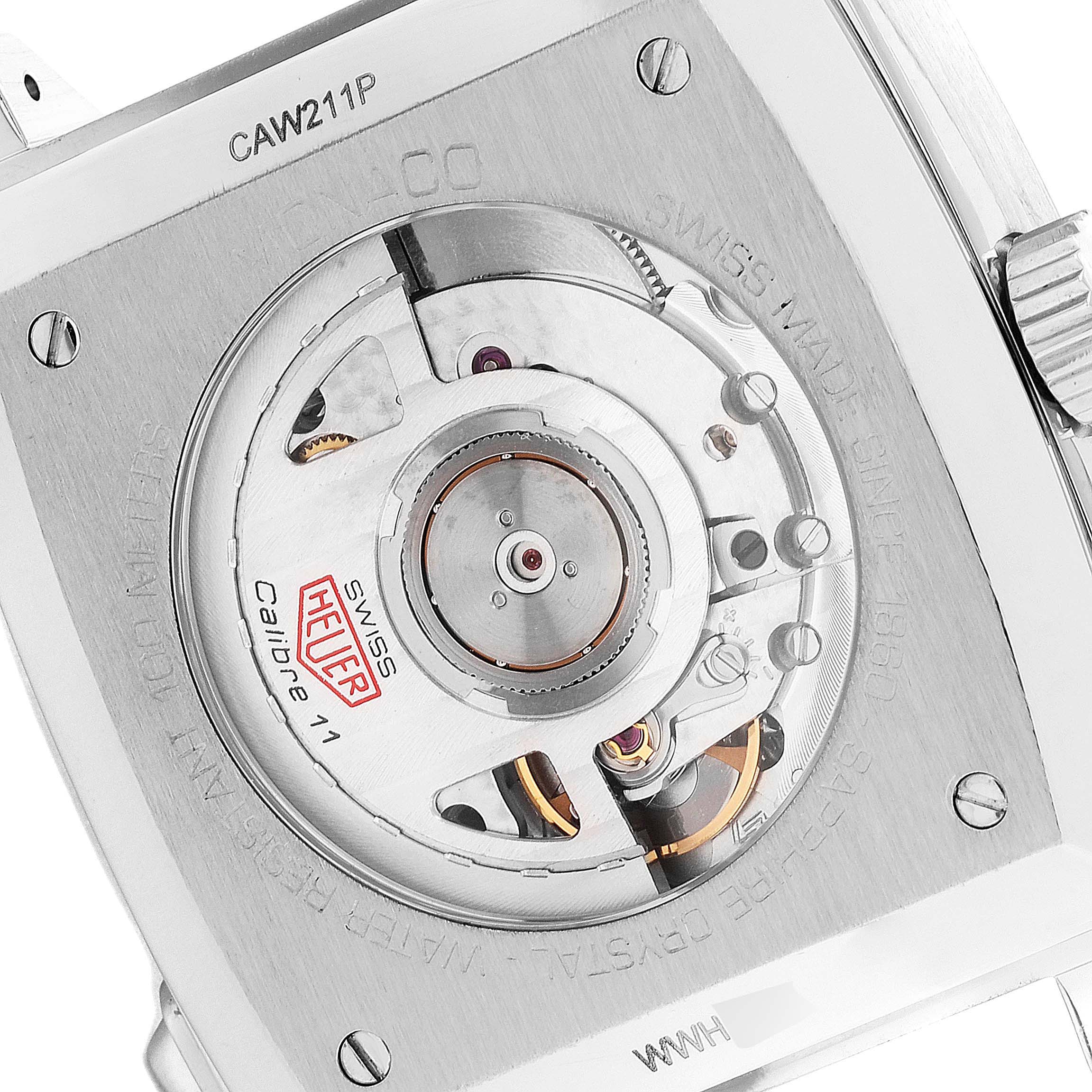 The image shows the back of a Tag Heuer Monaco CAW211P Men's Stainless Steel Blue Dial CAW211P Men's Stainless Steel Blue Dial watch, displaying its Calibre 11 movement and internal mechanics.