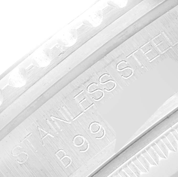This close-up image shows the side of a Tudor Prince model watch with the words "STAINLESS STEEL" engraved.