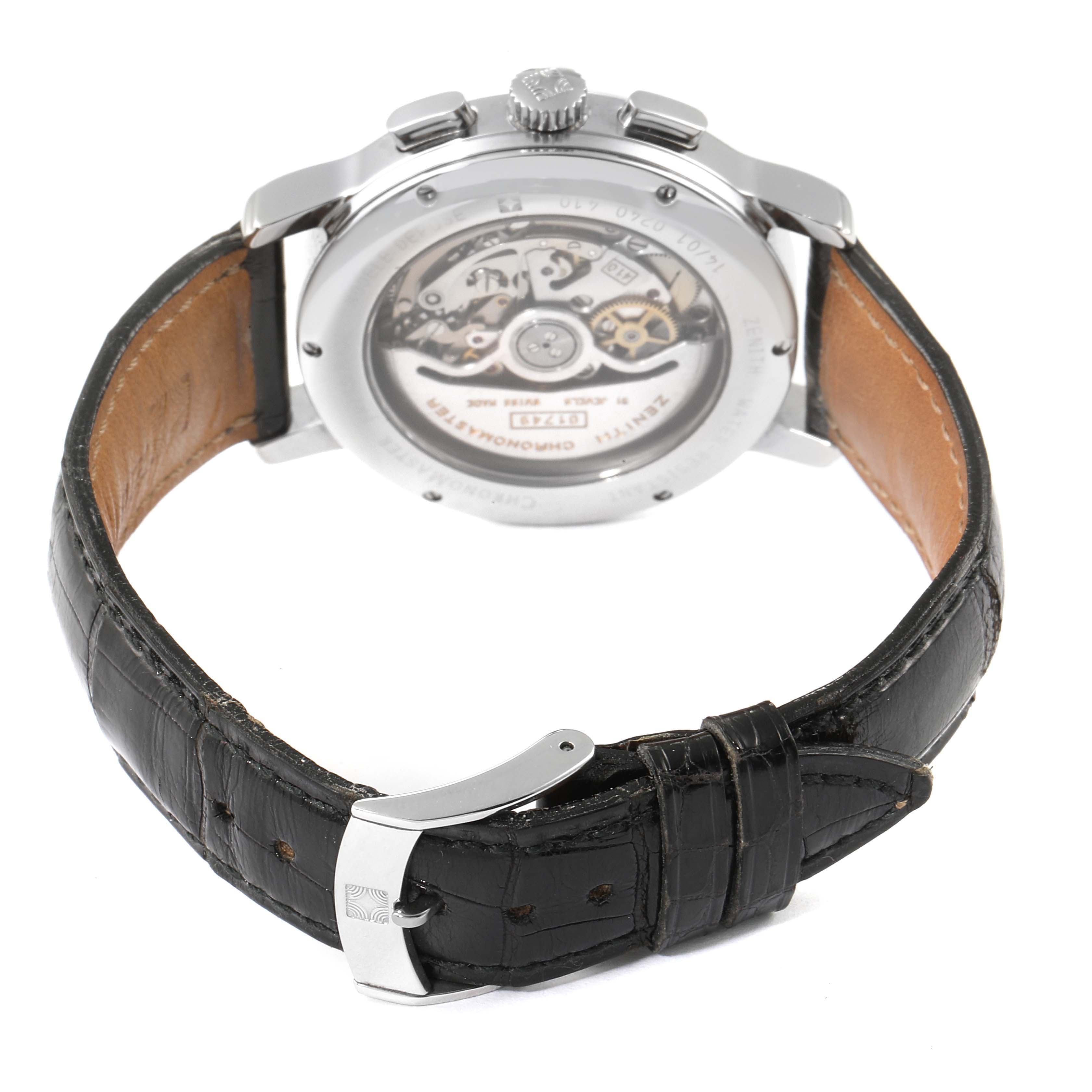 The image shows the back view of a Zenith Chronomaster 01.0240.410 Men's Stainless Steel Silver Dial 01.0240.410 Men's Stainless Steel Silver Dial watch, highlighting the transparent case back and leather strap.