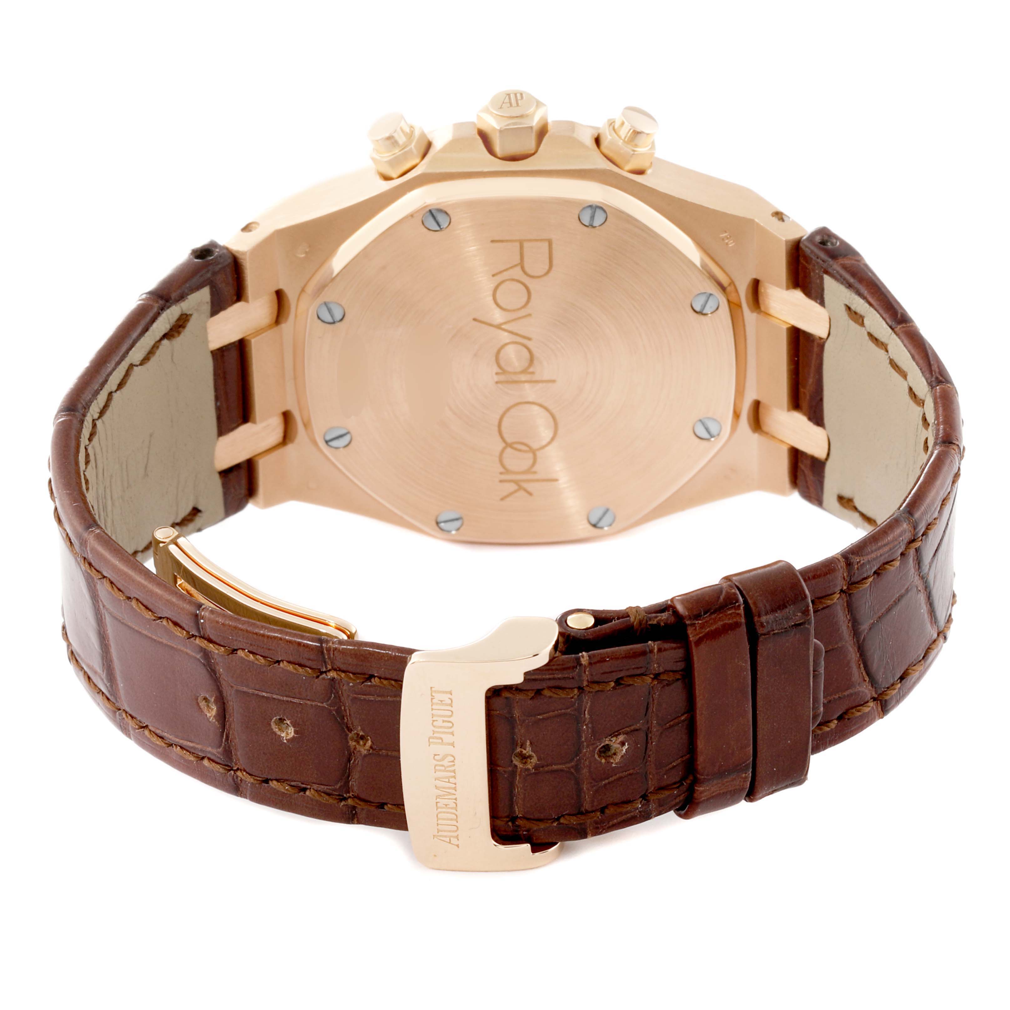 The image shows the back of a Royal Oak watch by Audemars Piguet, highlighting the case back and leather strap with clasp.