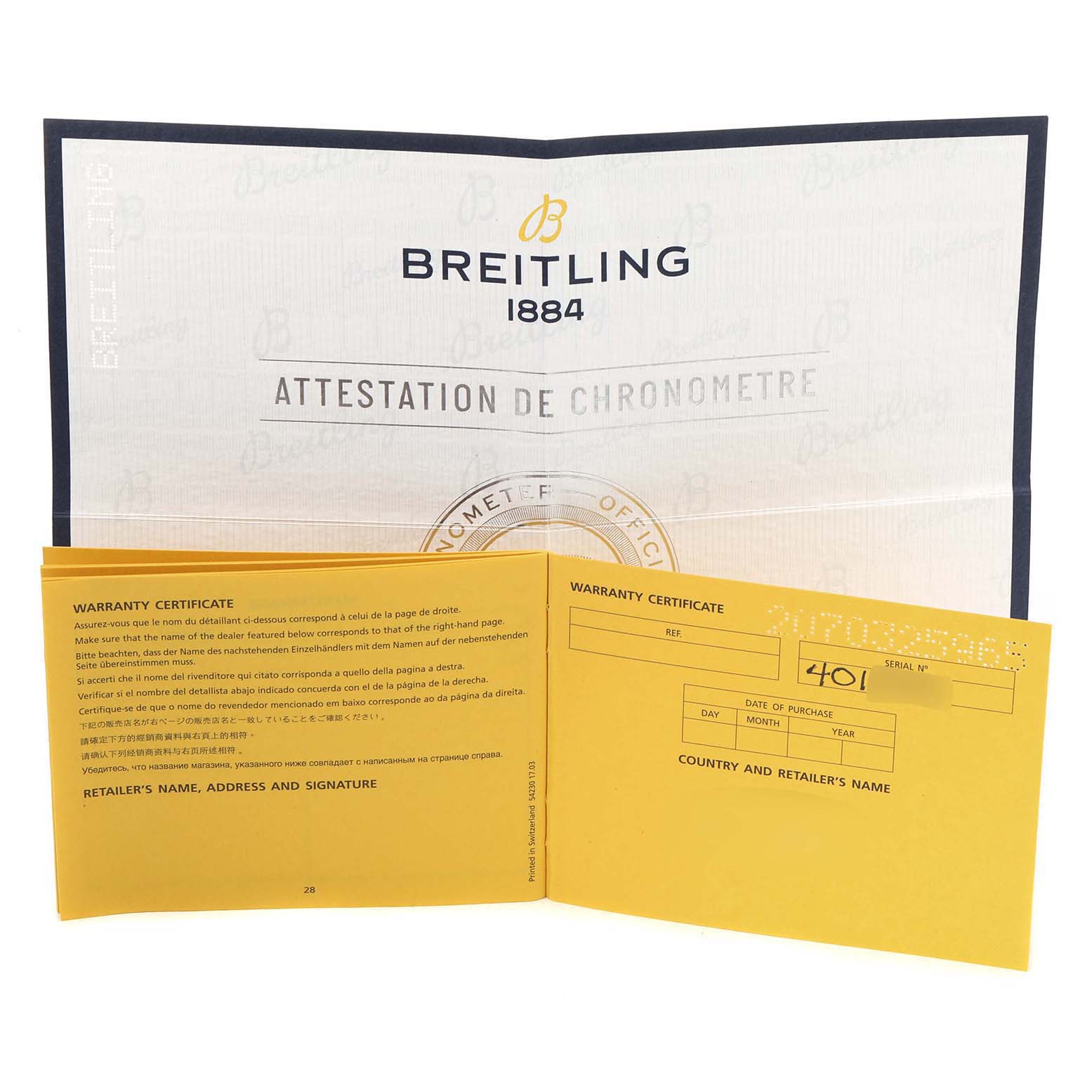 This image shows the warranty certificate and chronometer attestation documents for a Bentley model by Breitling.