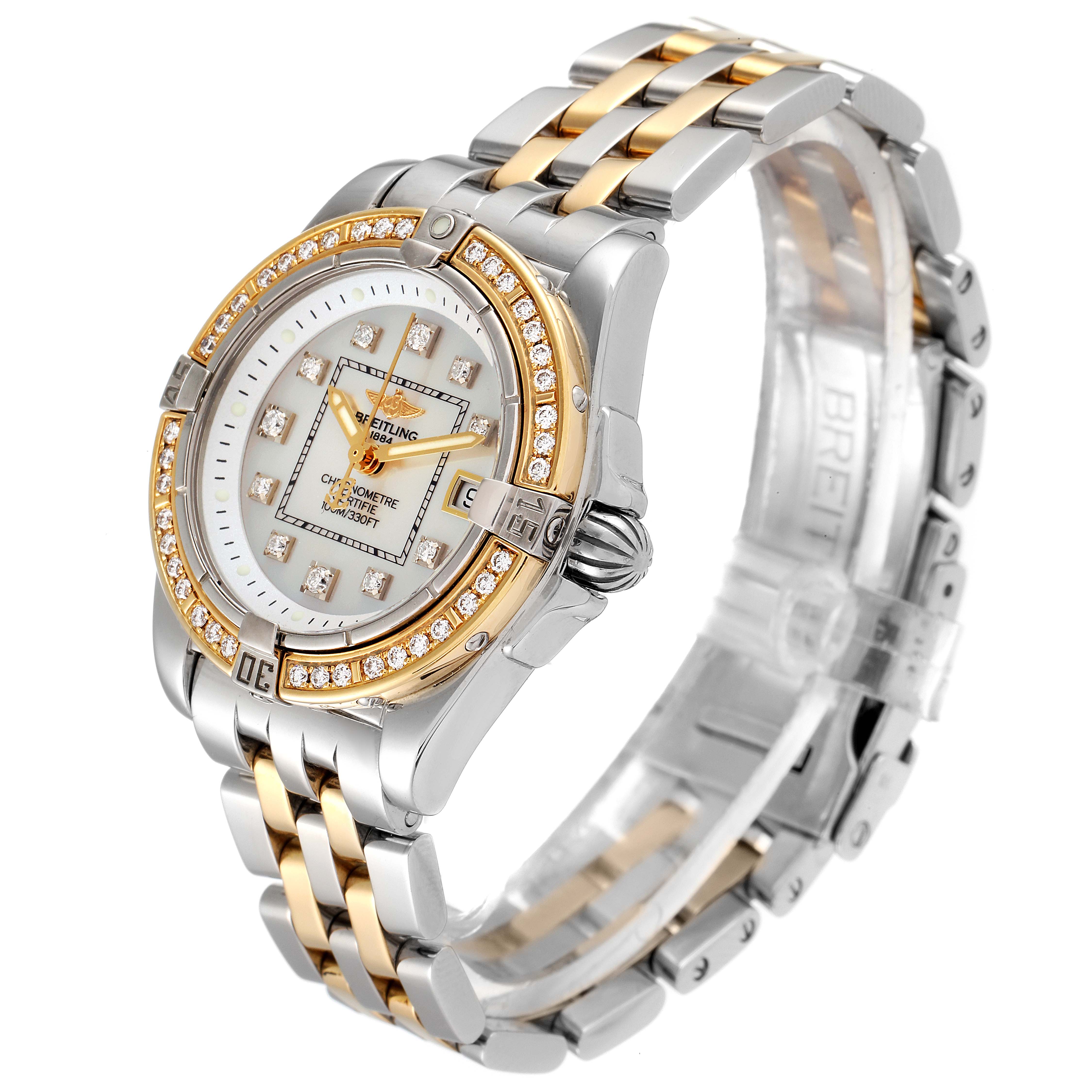 The image shows a Breitling D71356 Women's Steel and Gold (two tone) Mother of Pearl Dial D71356 Women's Steel and Gold (two tone) Mother of Pearl Dial Cockpit Steel 18K Yellow Gold Diamond Watch D71356 from an angled view, displaying its face, bezel, and bracelet.