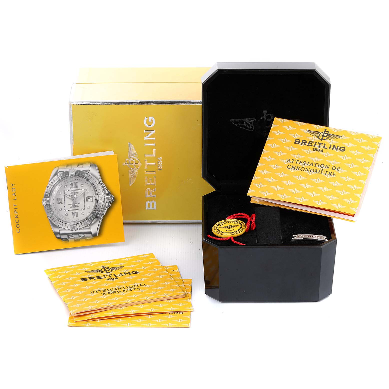 This image shows a Breitling D71356 Women's Steel and Gold (two tone) Mother of Pearl Dial D71356 Women's Steel and Gold (two tone) Mother of Pearl Dial Cockpit Steel 18K Yellow Gold Diamond Watch D71356 with its box, papers, and booklets from different angles.