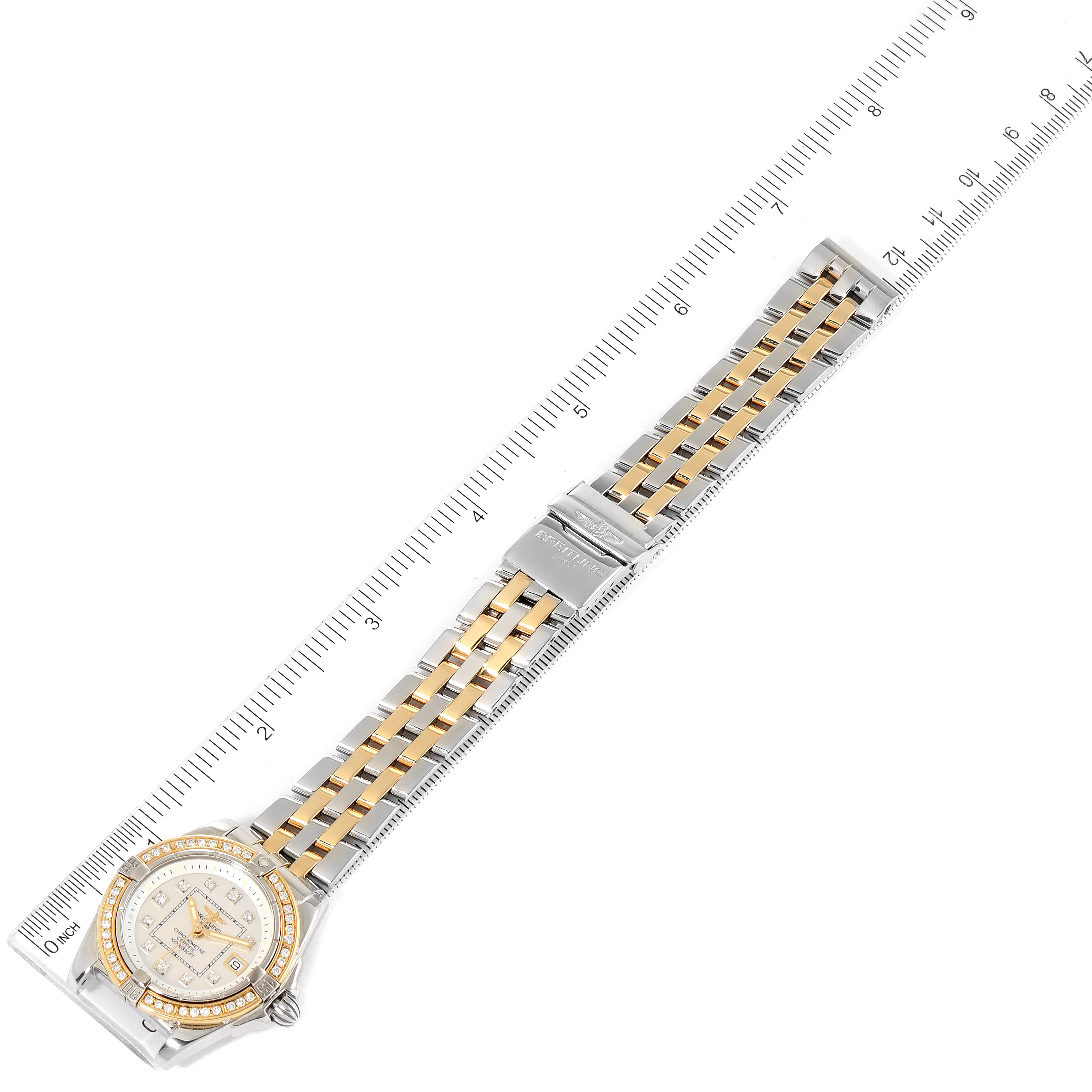 This image shows a top view of the Breitling D71356 Women's Steel and Gold (two tone) Mother of Pearl Dial D71356 Women's Steel and Gold (two tone) Mother of Pearl Dial Cockpit Steel 18K Yellow Gold Diamond Watch D71356, including the bracelet and case.