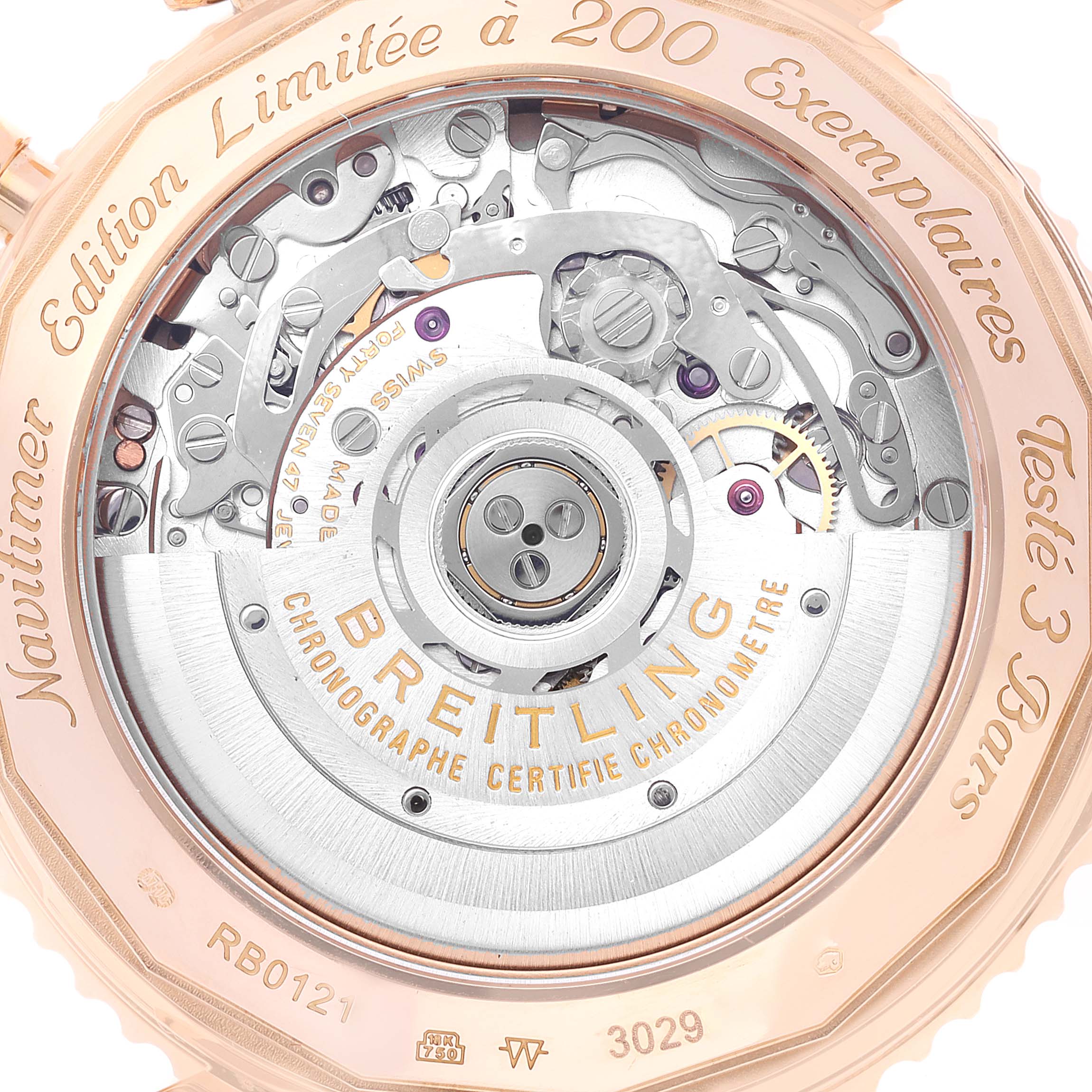 This image shows the back view of a Breitling Navitimer RB0121 Men's Rose Gold Black Dial RB0121 Men's Rose Gold Black Dial watch, highlighting its intricate mechanical movement.