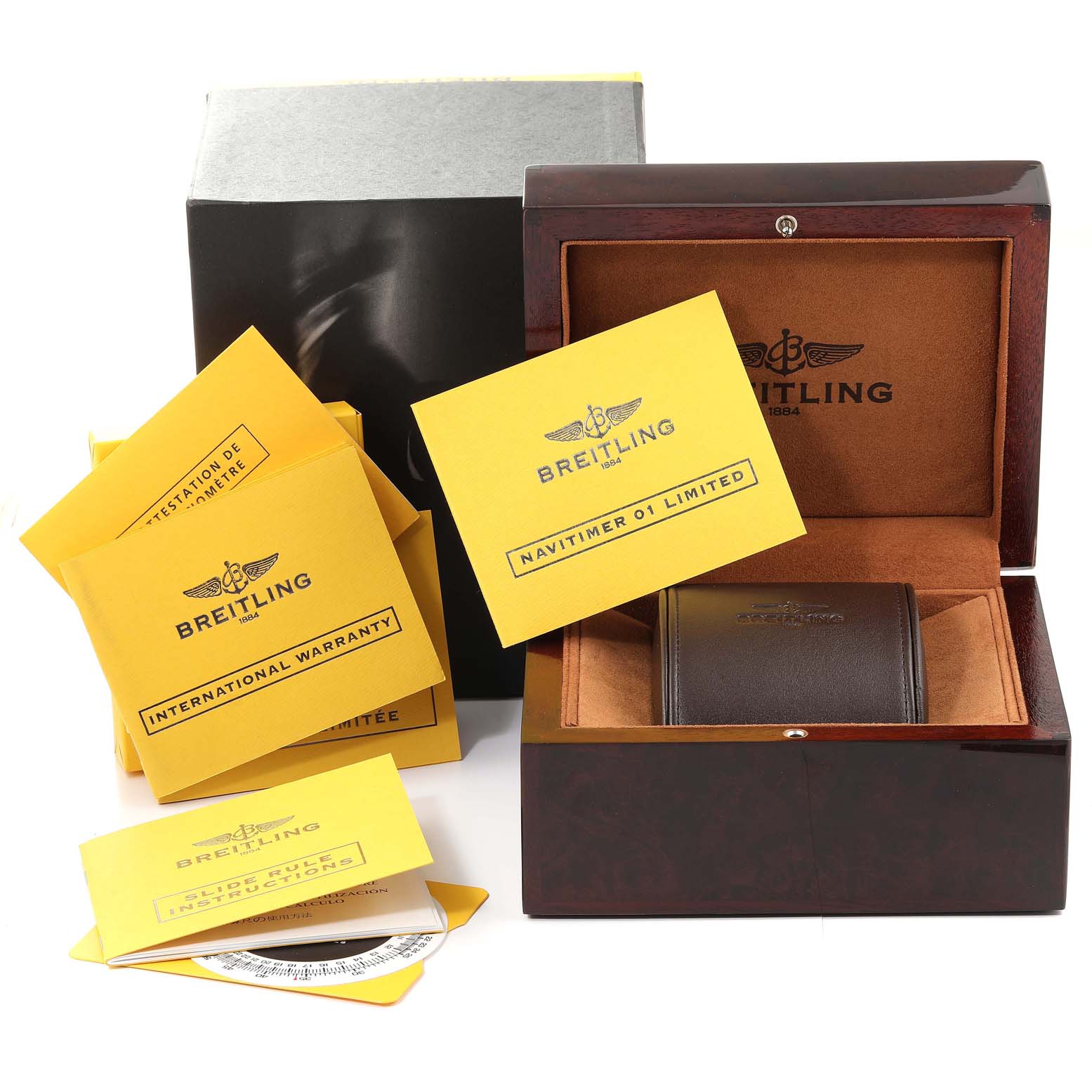 The image shows a Breitling Navitimer RB0121 Men's Rose Gold Black Dial RB0121 Men's Rose Gold Black Dial model's box, paperwork, and warranty cards.