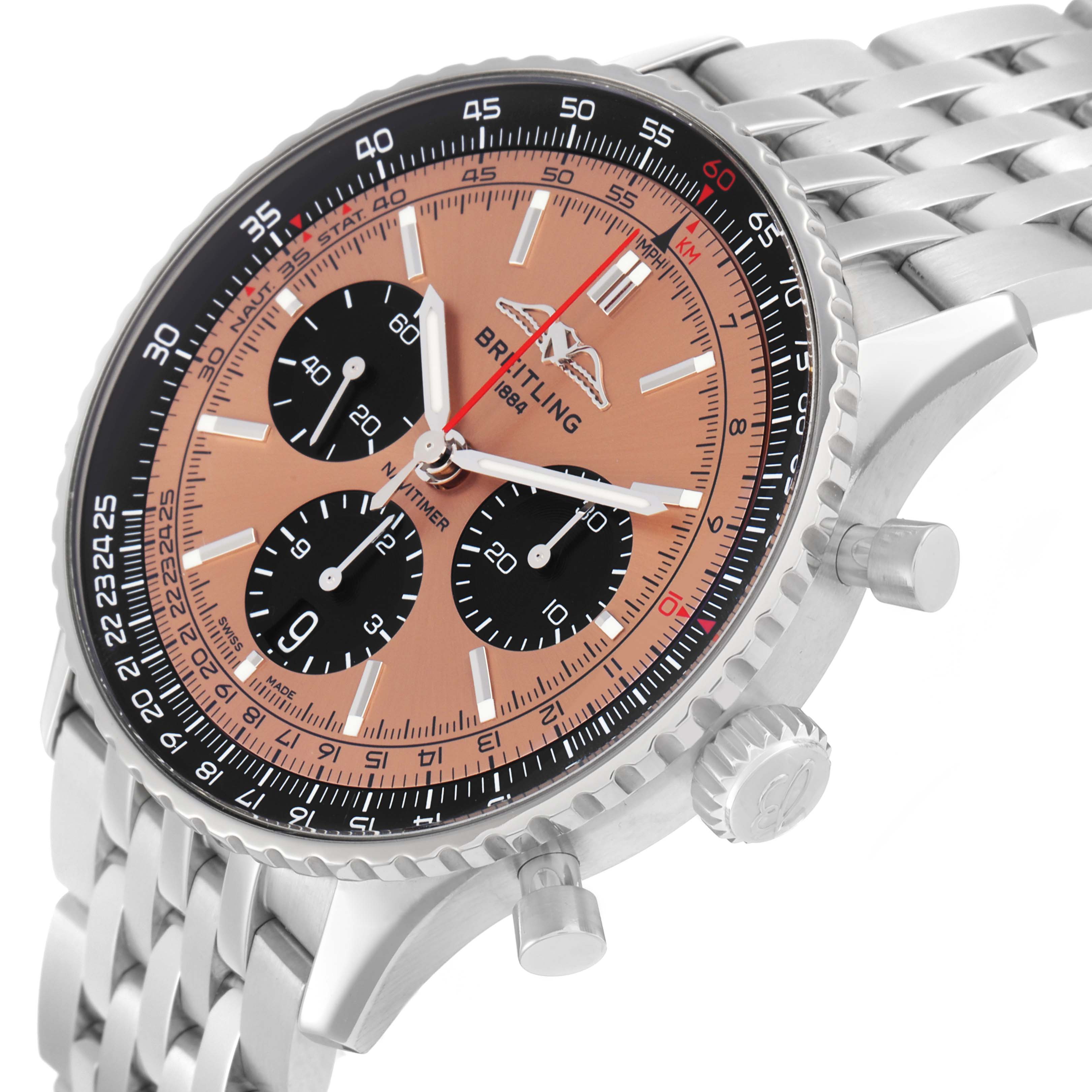 The Breitling Navitimer AB0138 Men
s Stainless Steel Pink Dial watch is shown at an angled side view, displaying the face, bezel, crown, pushers, and bracelet.