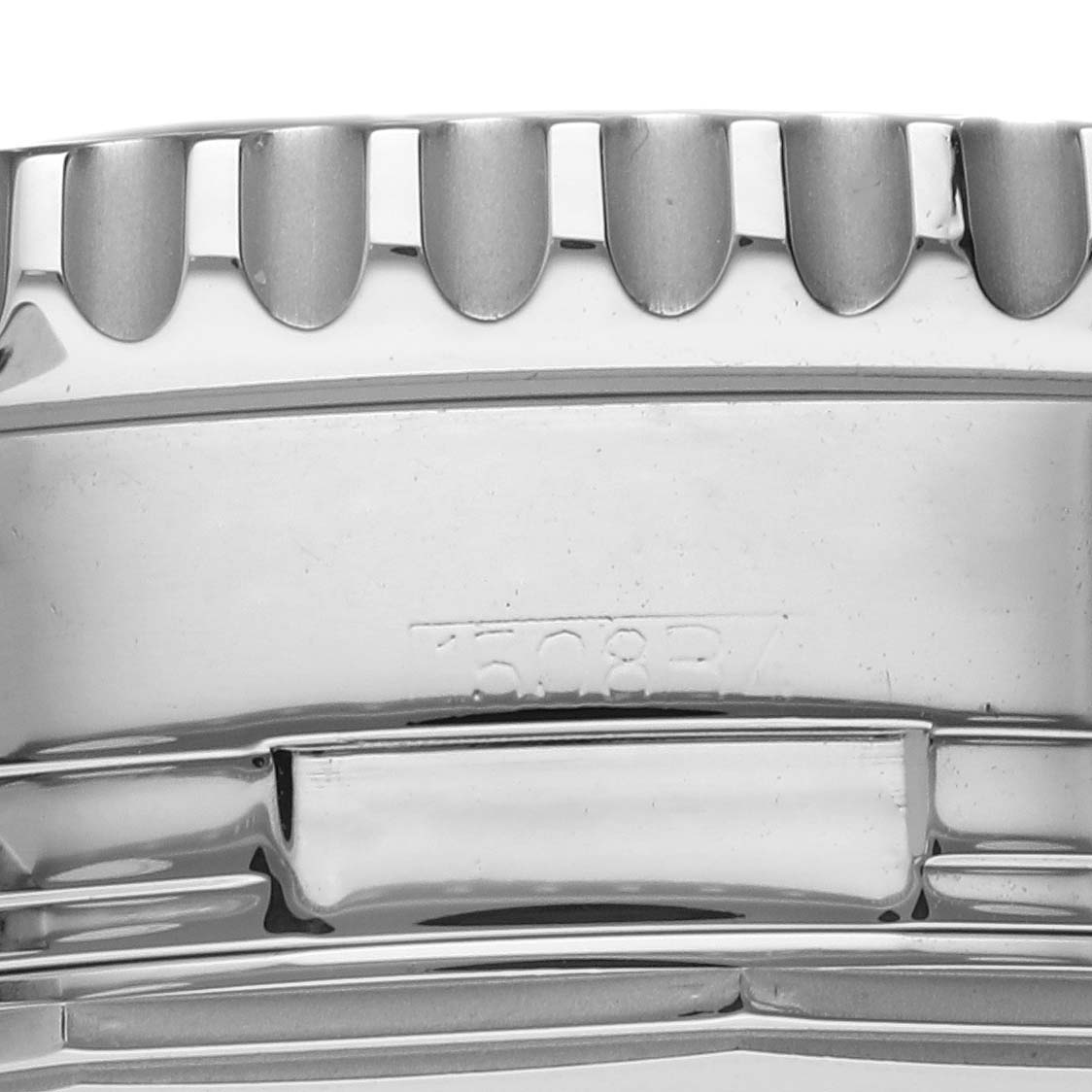 This image shows a close-up view of the bezel and crown of a Breitling Navitimer A24322 Men's Stainless Steel Black Dial A24322 Men's Stainless Steel Black Dial watch.