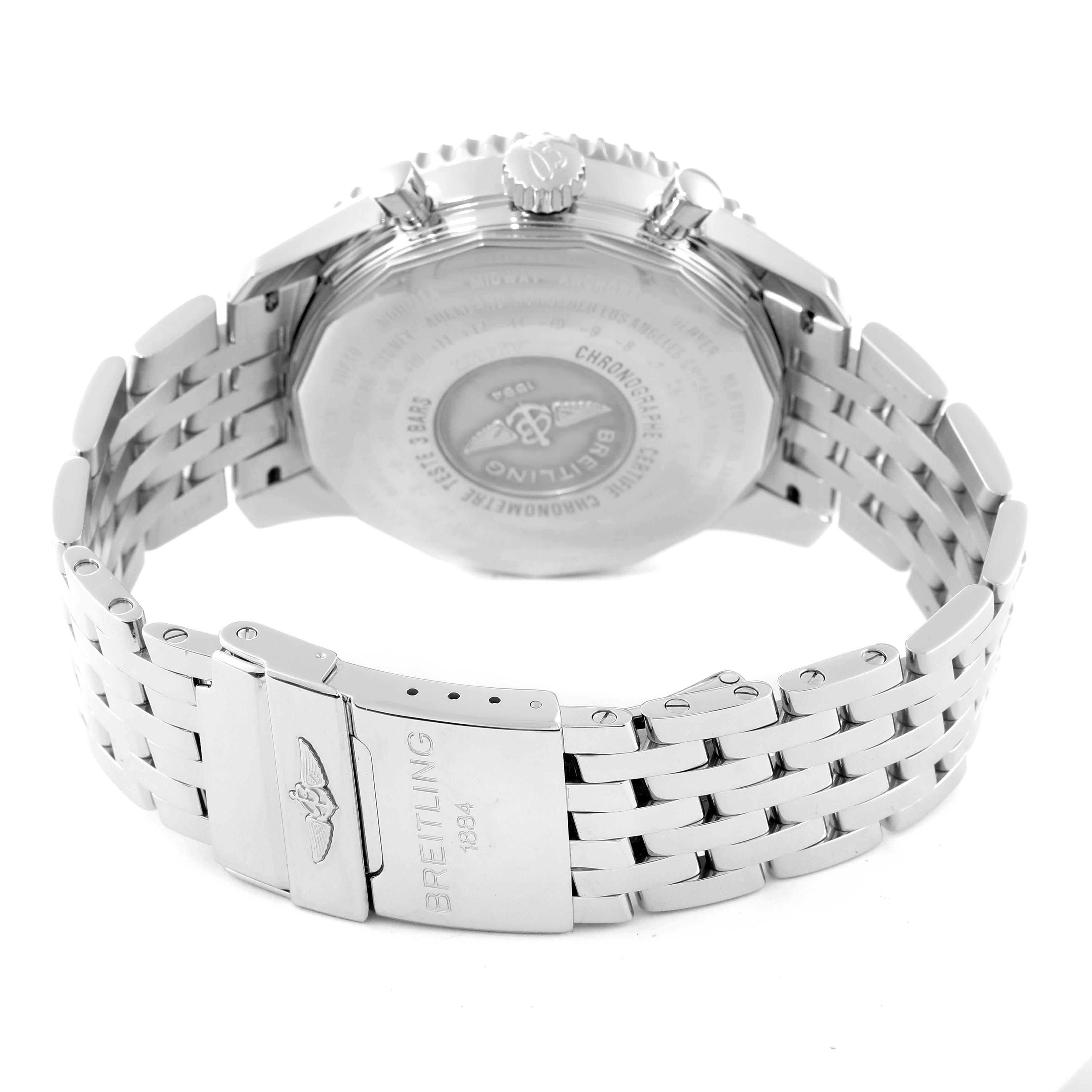 The image shows the back and clasp of a Breitling Navitimer A24322 Men's Stainless Steel Black Dial A24322 Men's Stainless Steel Black Dial watch, highlighting the engraved back case and stainless steel bracelet.