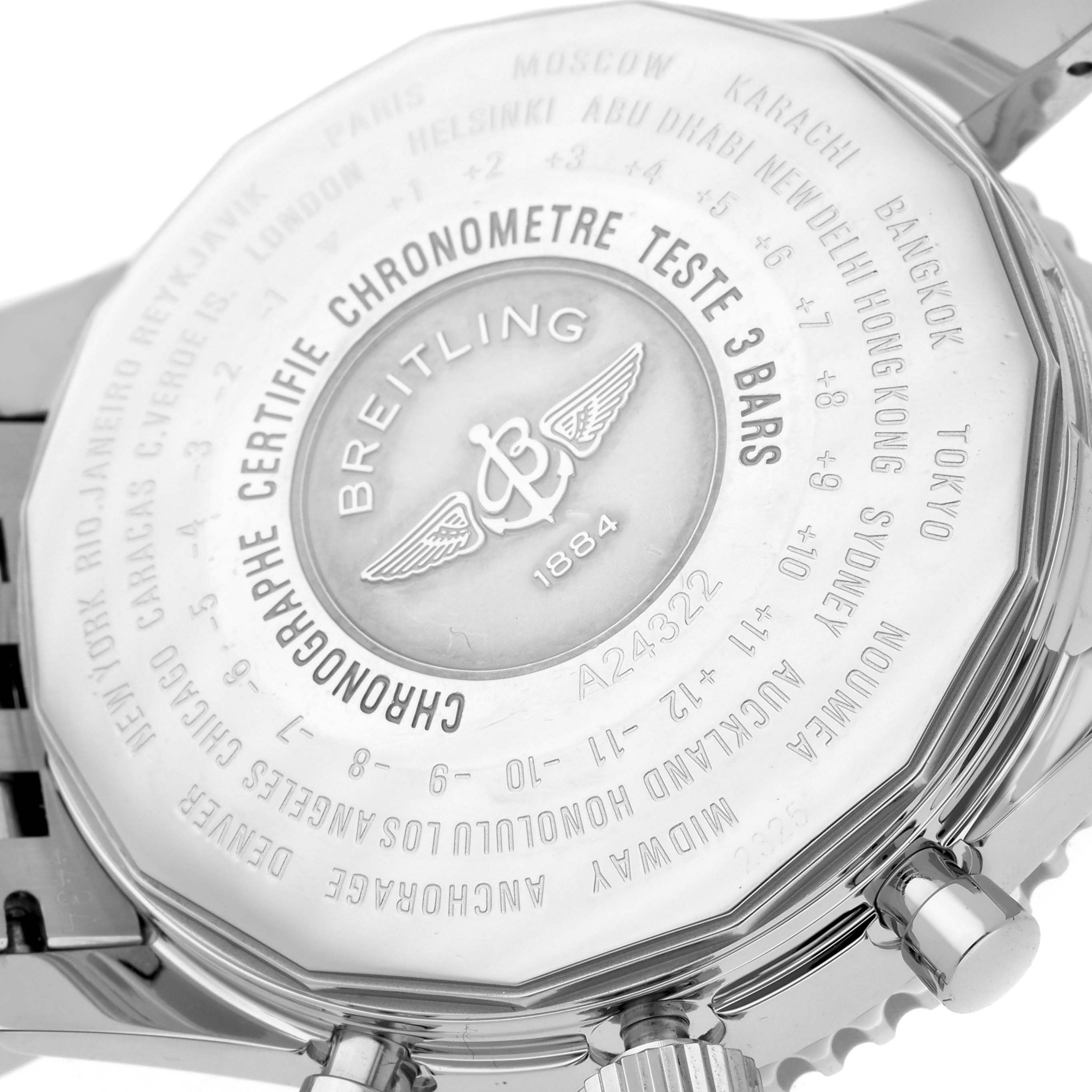 This image shows the back case of a Breitling Navitimer A24322 Men's Stainless Steel Black Dial A24322 Men's Stainless Steel Black Dial watch, highlighting the brand logo, model details, and city time zones.