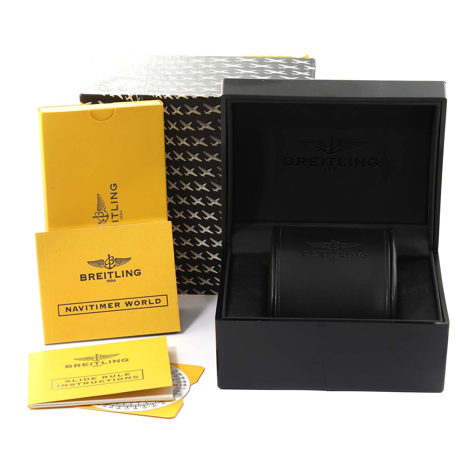 The image shows the Breitling Navitimer A24322 Men's Stainless Steel Black Dial A24322 Men's Stainless Steel Black Dial watch box, instructions, and packaging from a front angle.