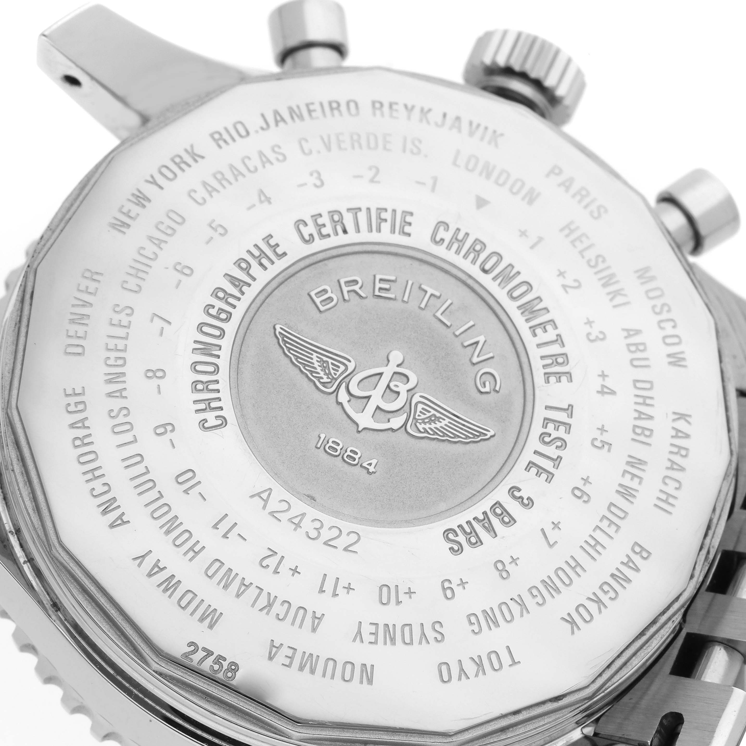 The image shows the back case of a Breitling Navitimer A2432212/G571 Men's Stainless Steel White Dial A2432212/G571 Men's Stainless Steel White Dial watch, displaying city names, the brand logo, and various inscriptions.