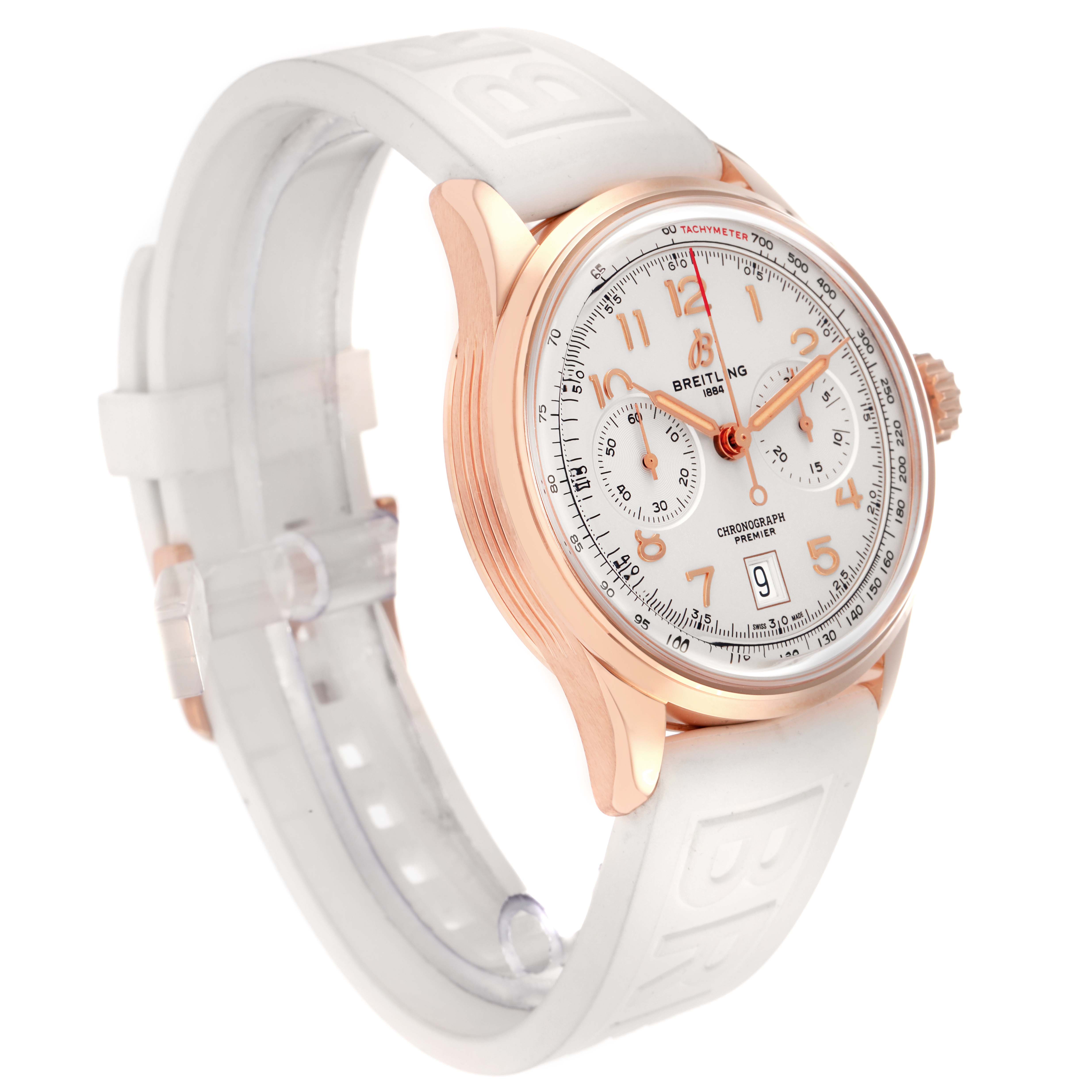 The Breitling Premier RB0145371G1R1 Men
s Rose Gold White Dial watch is shown at a slight side angle, displaying the watch face, crown, and white rubber strap.