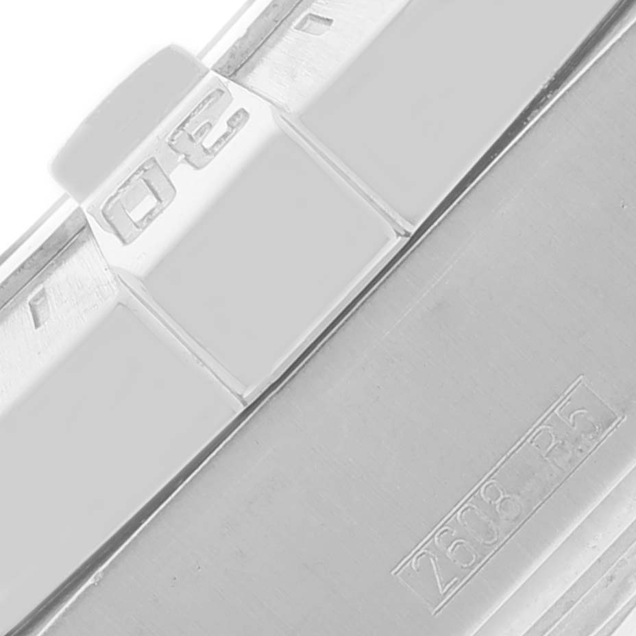 The image shows a close-up of the bezel and case side of a Breitling Superocean A17390 Men's Stainless Steel Black Dial A17390 Men's Stainless Steel Black Dial watch, highlighting the "30" marker and some engraved lettering.