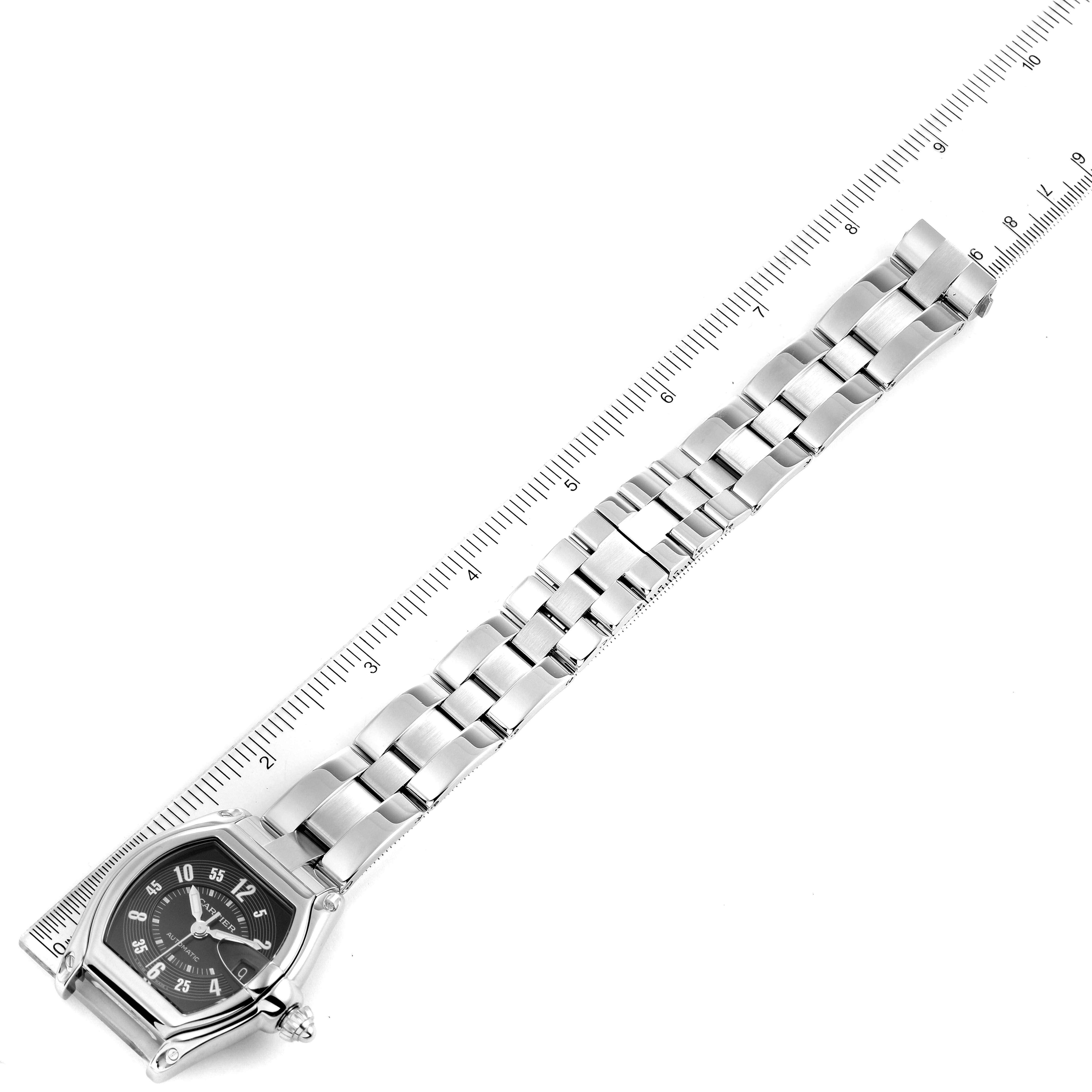 The image shows a top-down view of the entire strap and face of the Cartier Roadster W62004V3 Men
s Stainless Steel Black Dial W62004V3 Men
s Stainless Steel Black Dial watch alongside a ruler for scale.