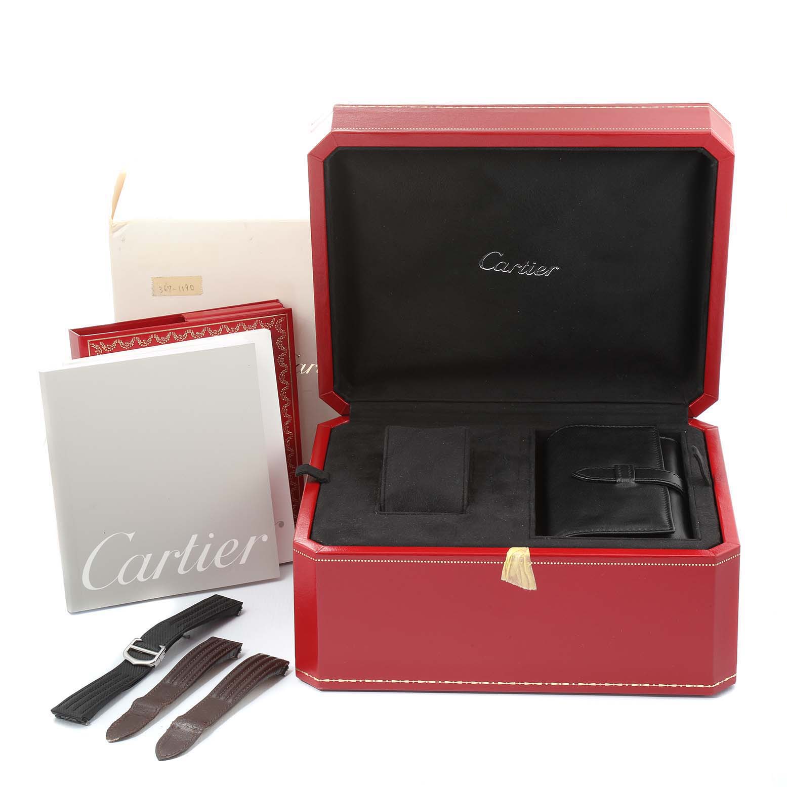 The image shows Cartier Roadster W62019X6 Men
s Stainless Steel Silver Dial W62019X6 Men
s Stainless Steel Silver Dial watch packaging, straps, and a booklet, all in a neatly arranged manner.