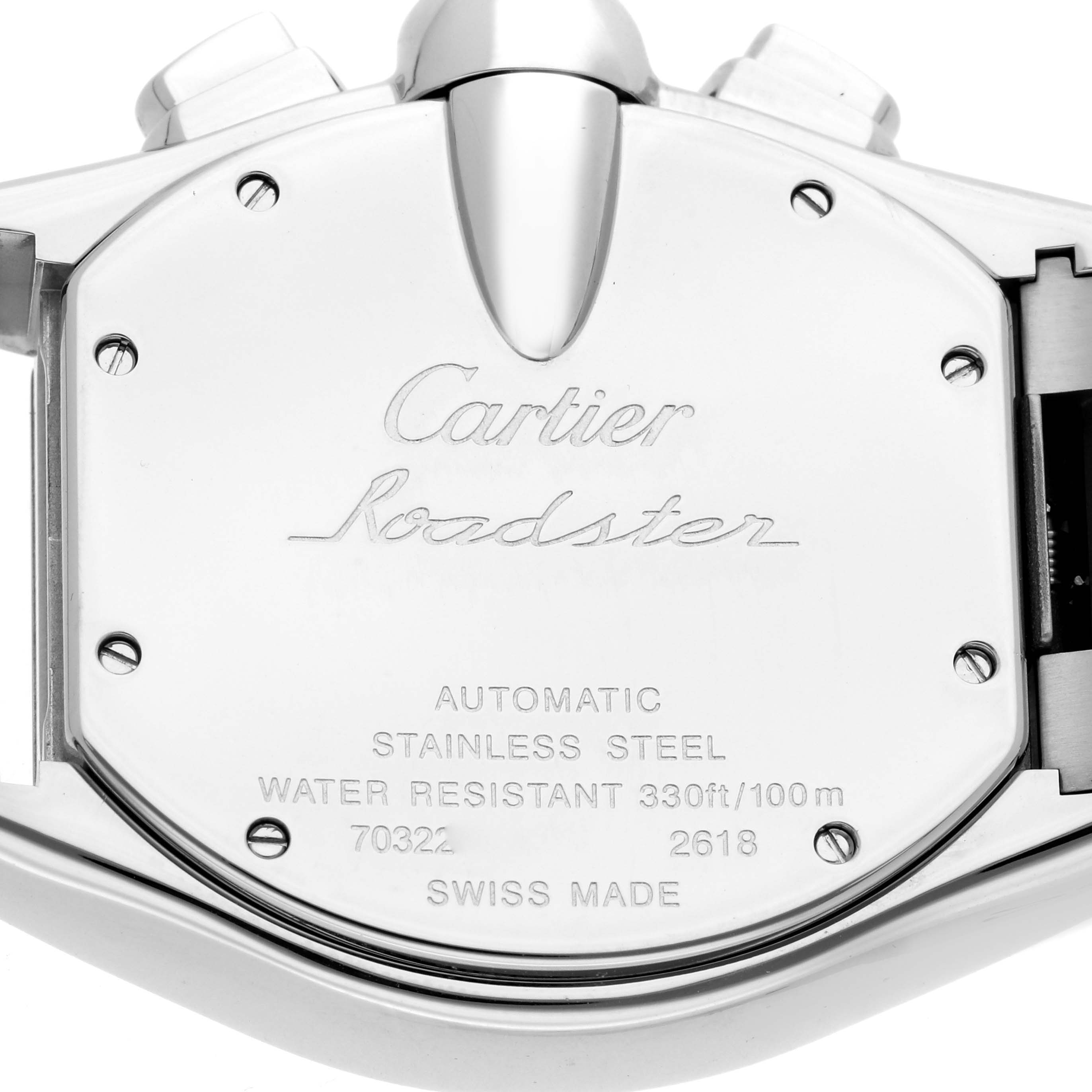 The image shows the back case of a Cartier Roadster W62020X6 Men
s Stainless Steel Black Dial watch, highlighting its engravings and stainless steel finish.