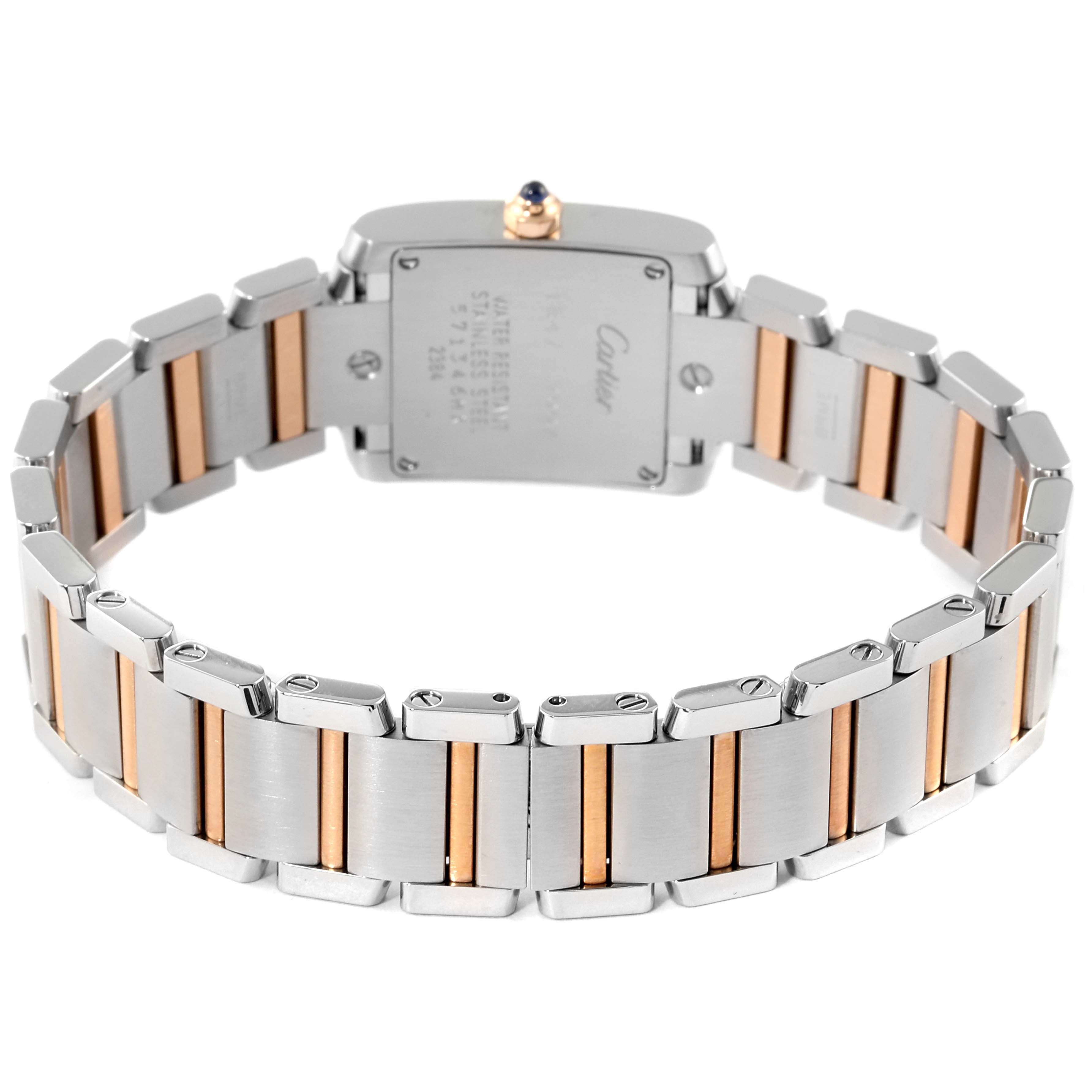 The image shows the back of a Cartier Tank Francaise 2384 Women's Steel and Gold (two tone) Silver Dial 2384 Women's Steel and Gold (two tone) Silver Dial watch, highlighting its two-tone metal bracelet and case back.