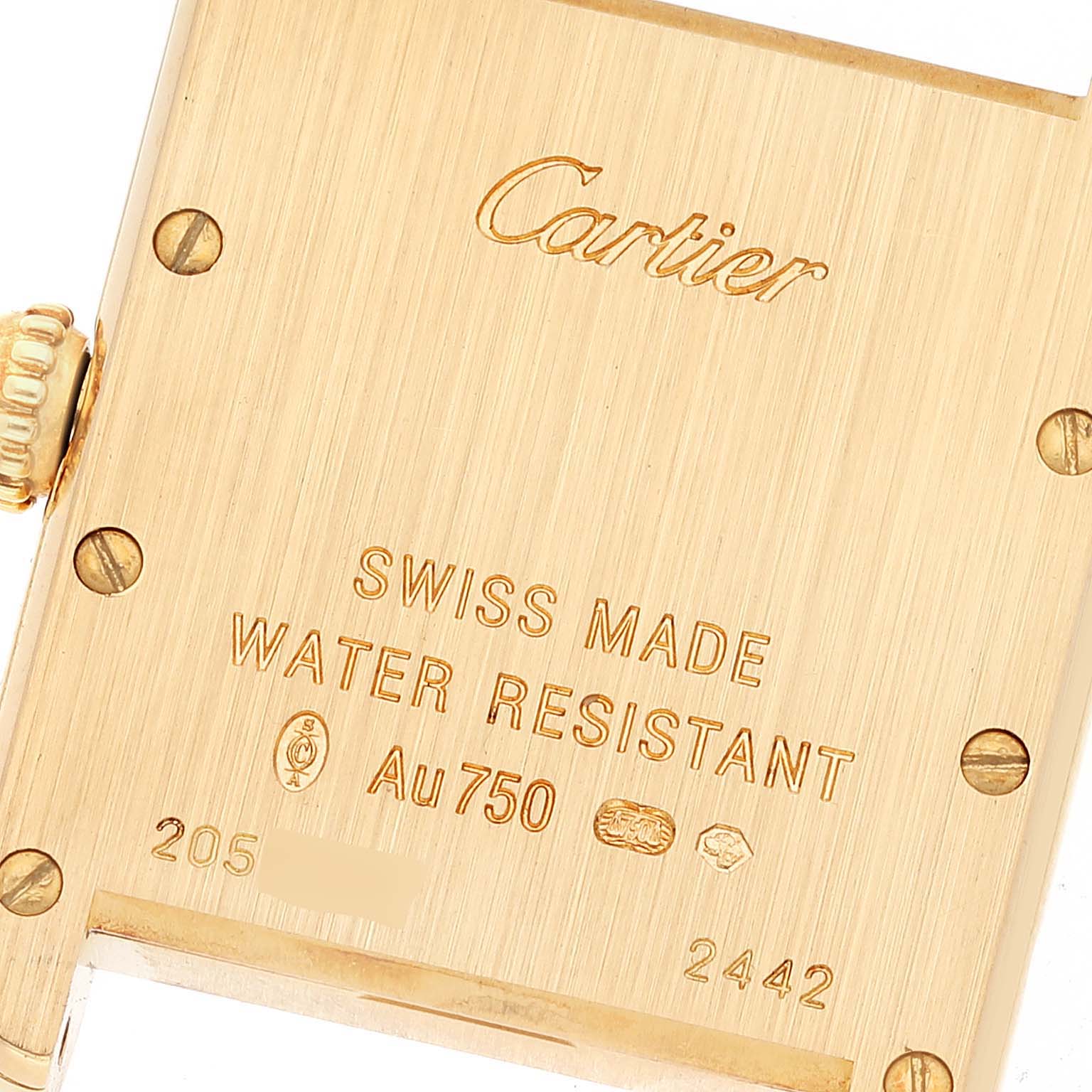 The image shows the engraved case back and crown of a Cartier Tank Louis W1529856 Women's Yellow Gold Silver Dial W1529856 Women's Yellow Gold Silver Dial watch.