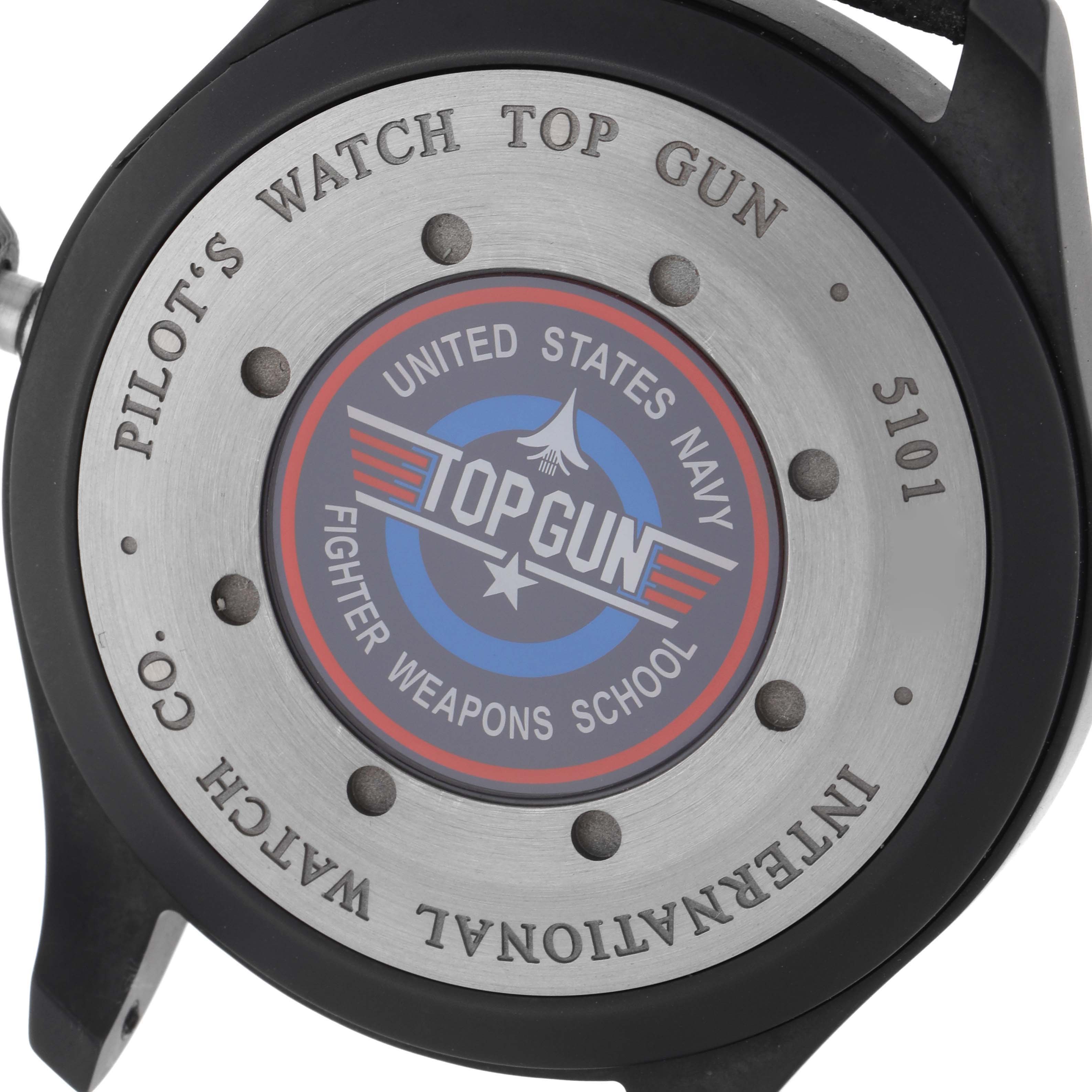 The image shows the case back of an IWC Pilot IW502902 Men
s Ceramic Black Dial
s Watch, showcasing the "TOP GUN" insignia.