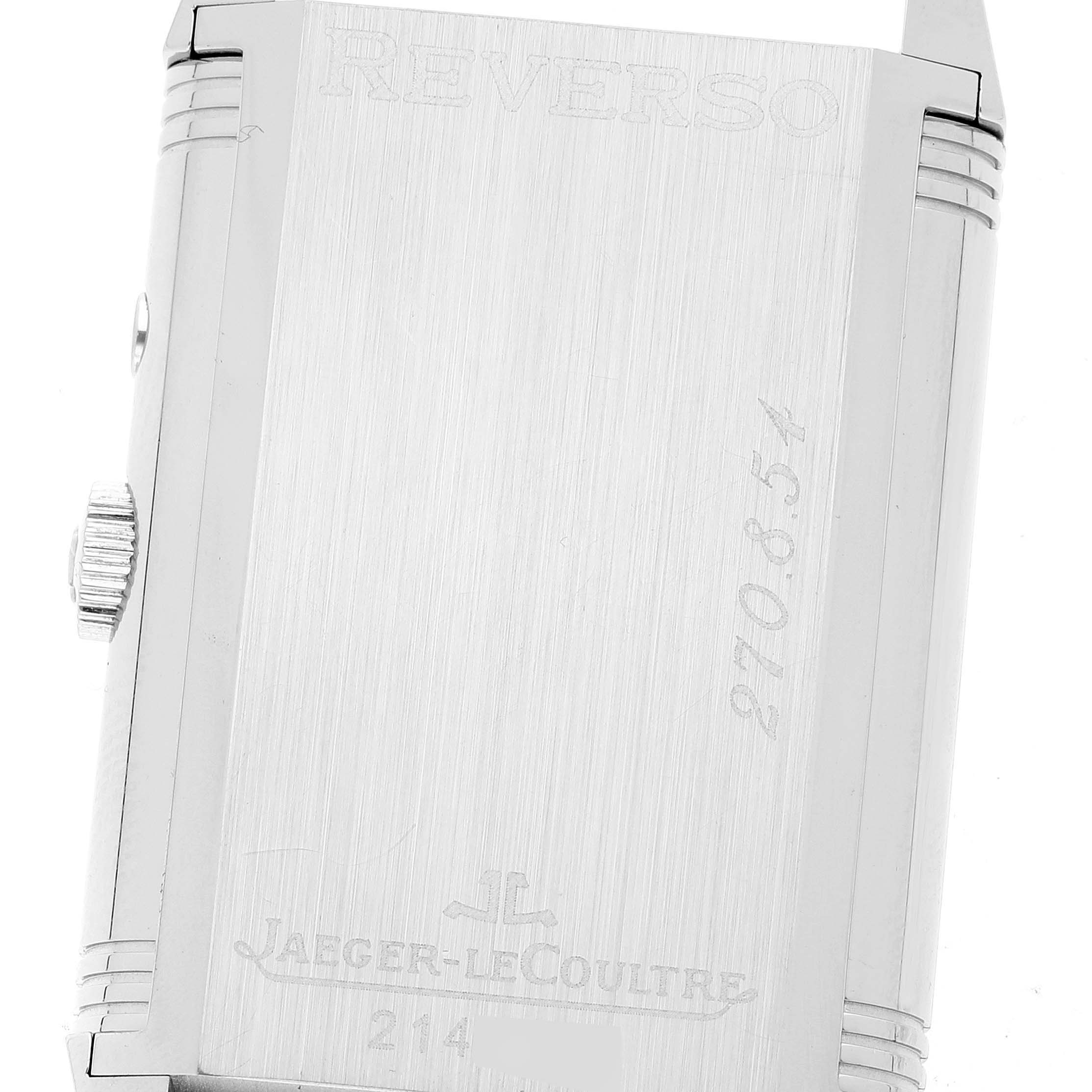 The image shows the back of a Jaeger-LeCoultre Reverso watch, highlighting the brand engraving and model number.