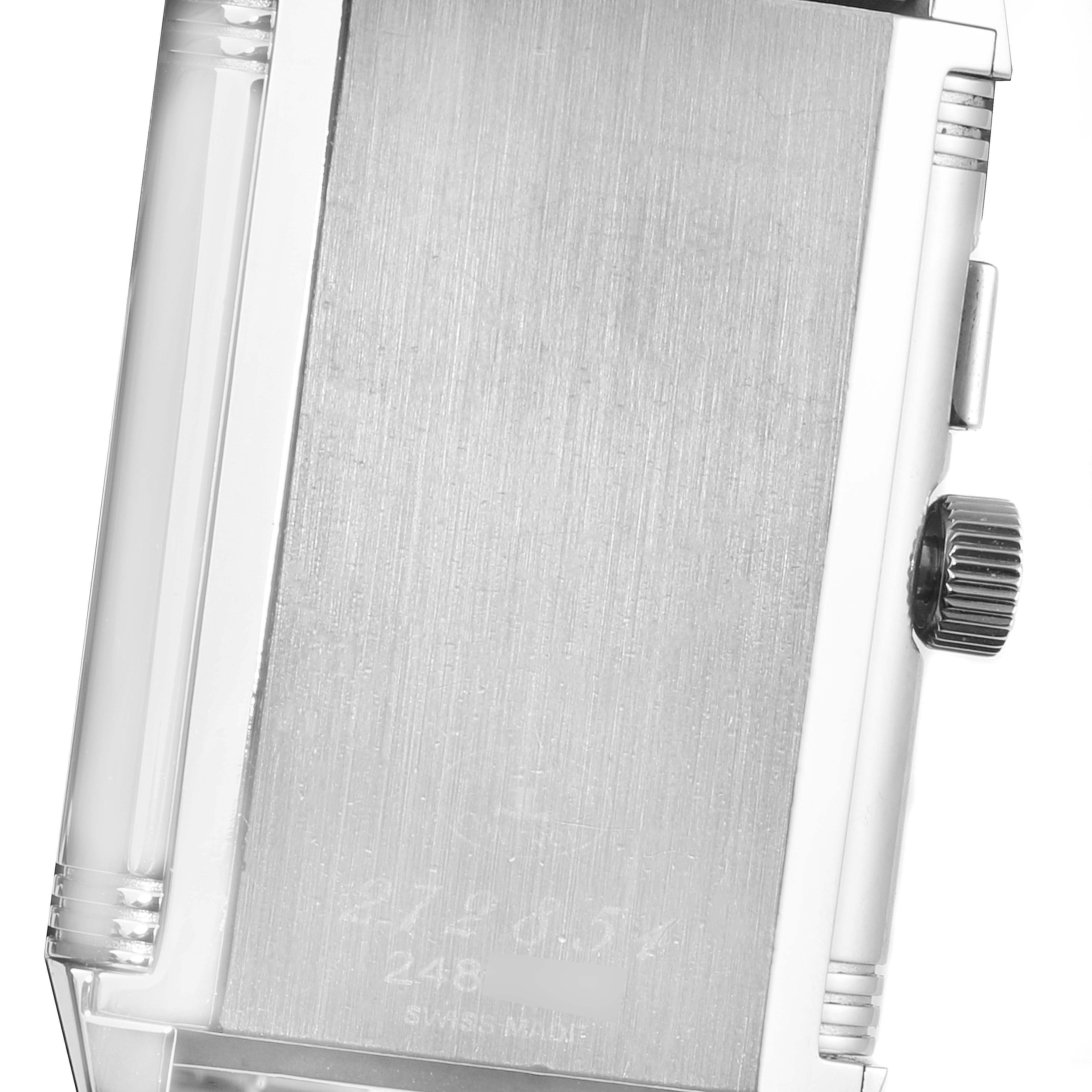 This image shows the side angle of the case back and crown of a Jaeger-LeCoultre Reverso watch.