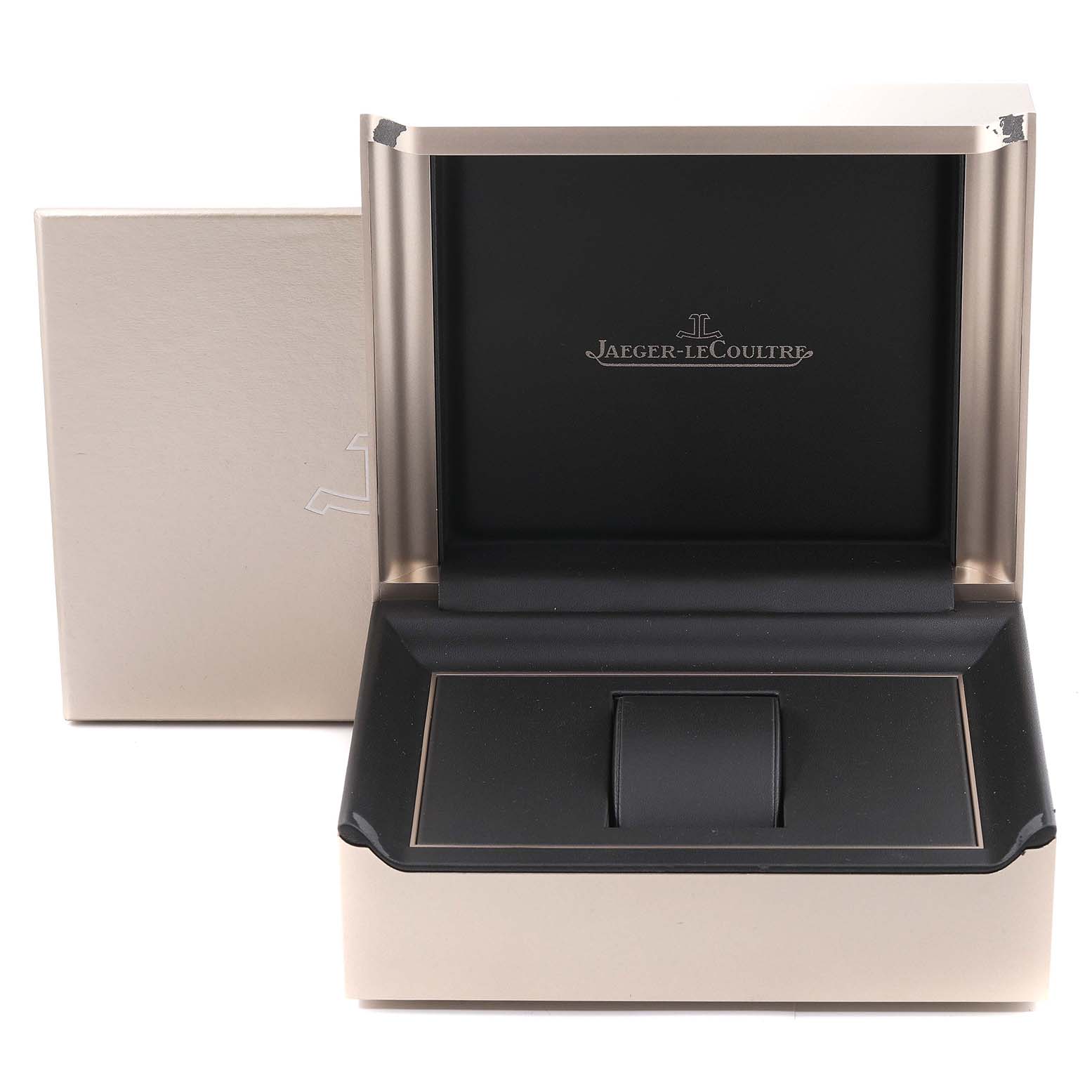 The image shows an empty Jaeger-LeCoultre Reverso model watch box with the lid open.