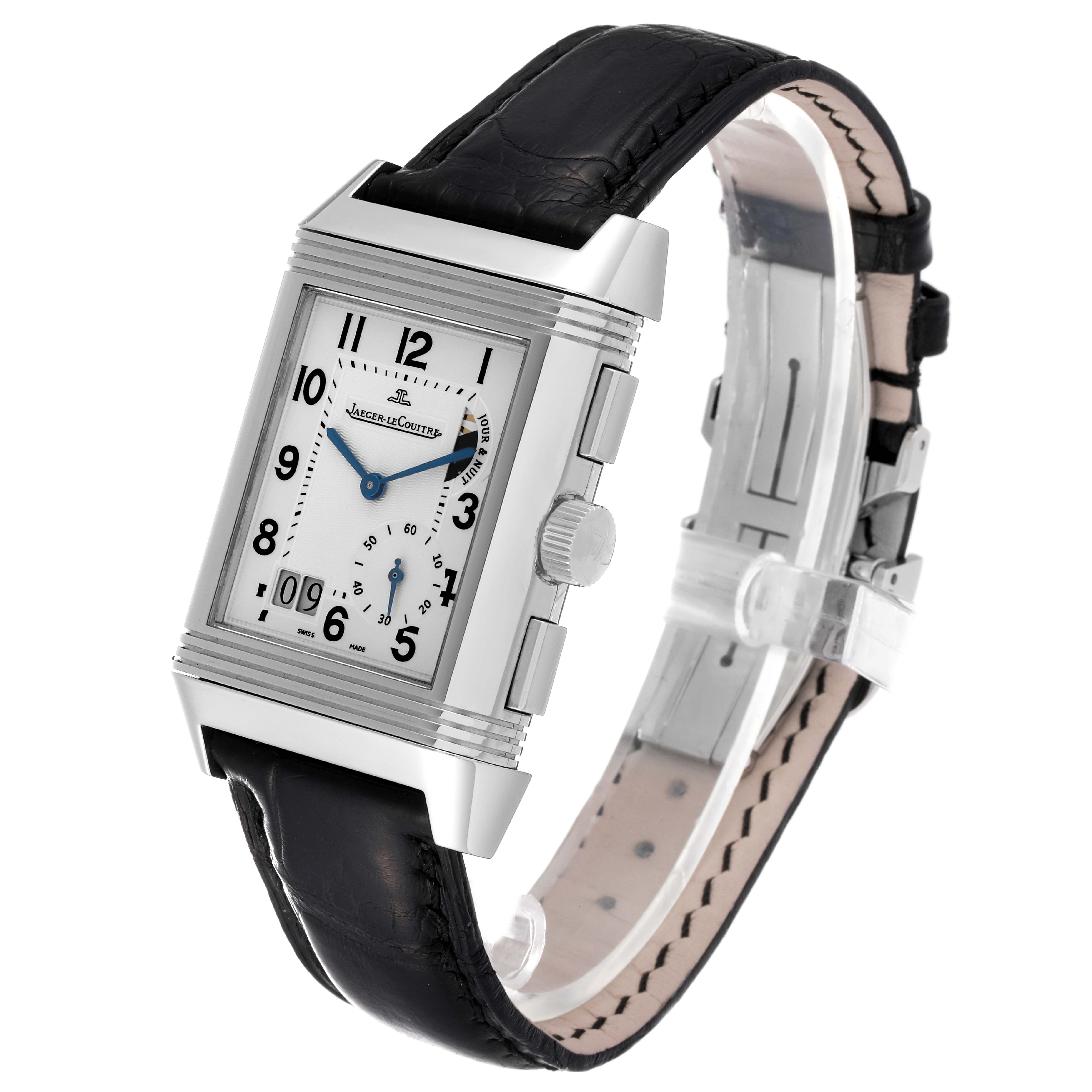 The image shows a Jaeger LeCoultre Reverso Q3028420 Men
s Stainless Steel Silver Dial Q3028420 Men
s Stainless Steel Silver Dial watch angled to display its rectangular dial, crown, and black leather strap.