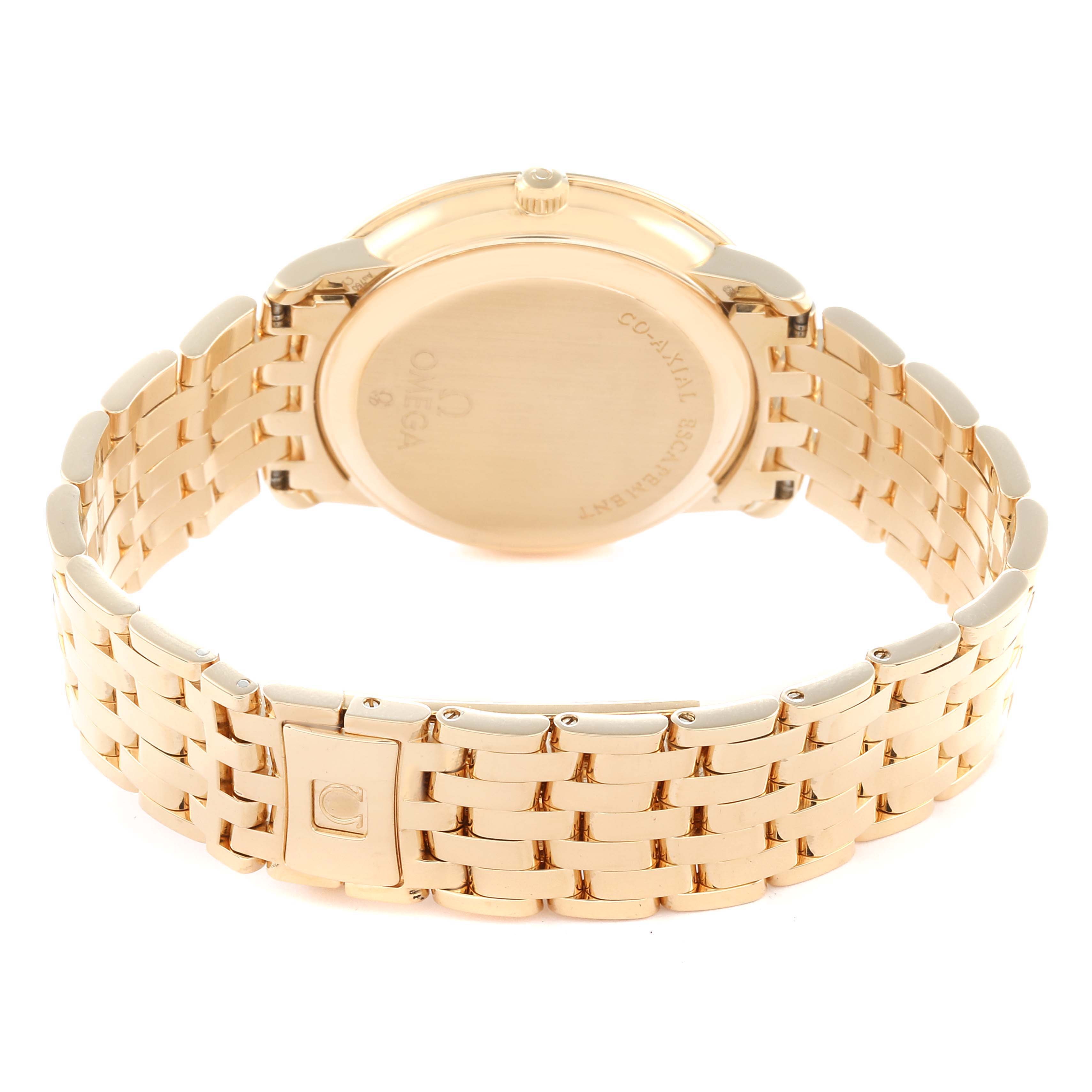 The image shows the backside of an Omega De Ville 413.58.37.20.58.001 Men's Yellow Gold Champagne Dial watch, highlighting the case back and bracelet.