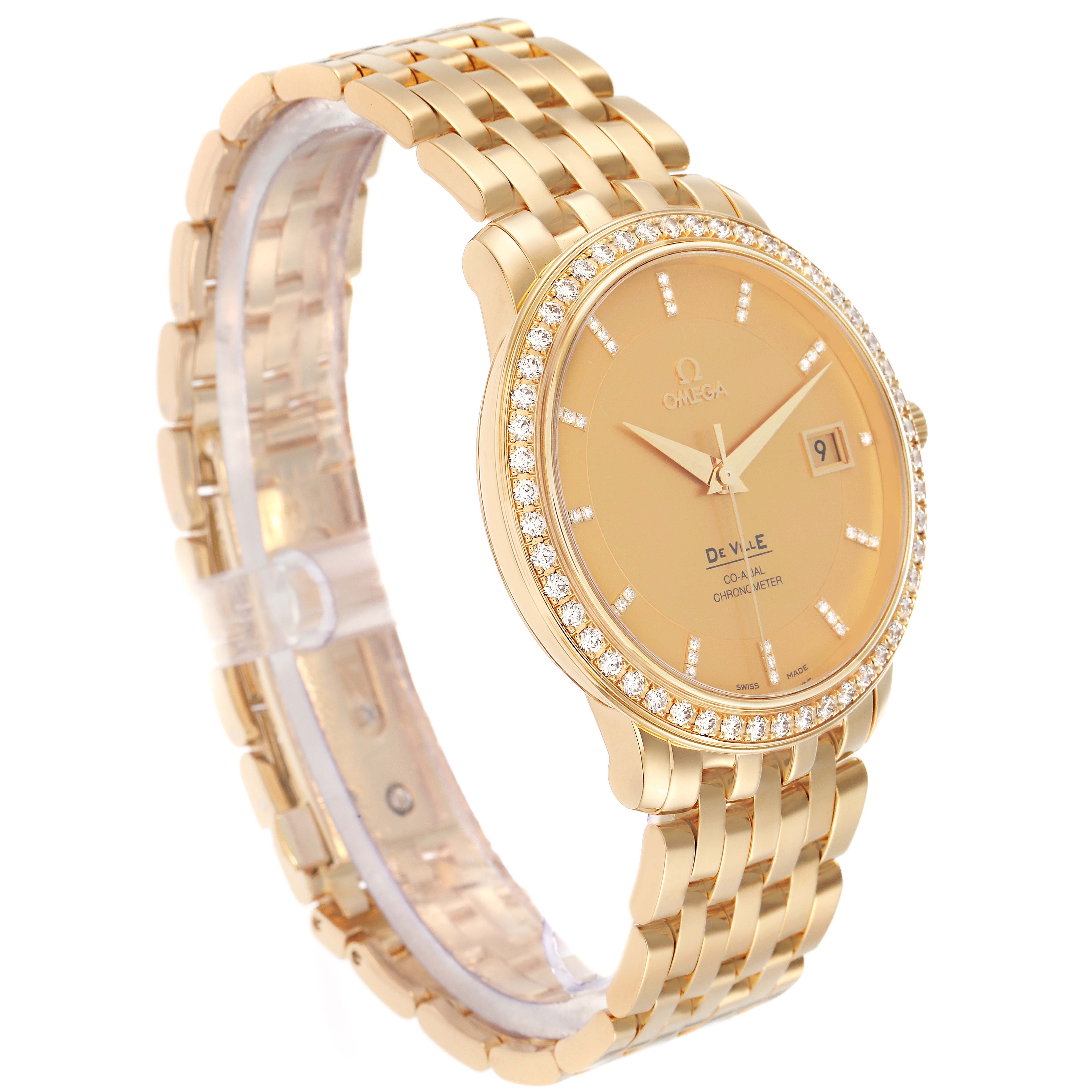The Omega De Ville 413.58.37.20.58.001 Men's Yellow Gold Champagne Dial watch is shown at an angle highlighting the face, bezel, and bracelet.