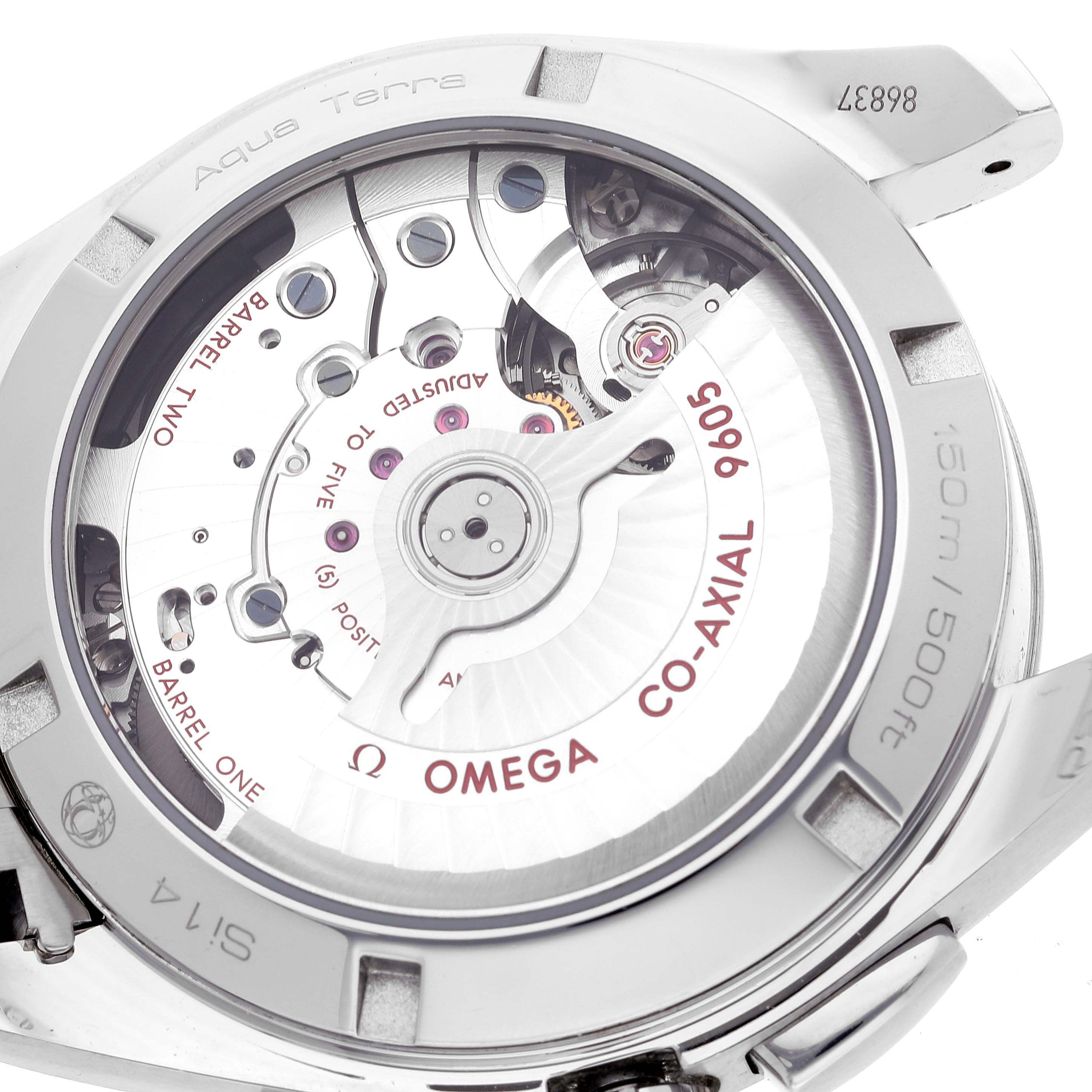The image shows the back of an Omega Aqua Terra 231.10.43.52.02.001 Men
s Stainless Steel Silver Dial 231.10.43.52.02.001 Men
s Stainless Steel Silver Dial watch, revealing the Co-Axial 9605 movement mechanism.