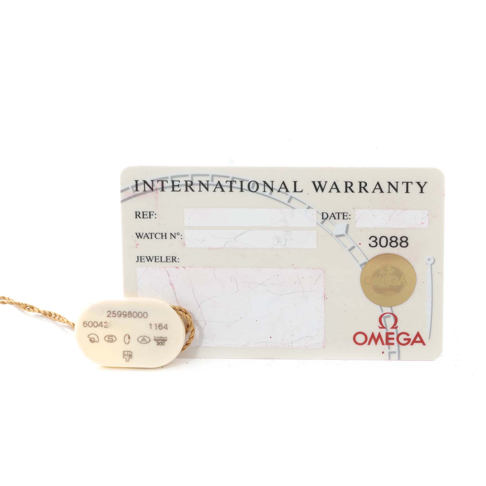 The image shows an Omega Seamaster 2599.80.00 Men
s Stainless Steel Blue Dial 2599.80.00 Men
s Stainless Steel Blue Dial International Warranty card and a hangtag with model information.