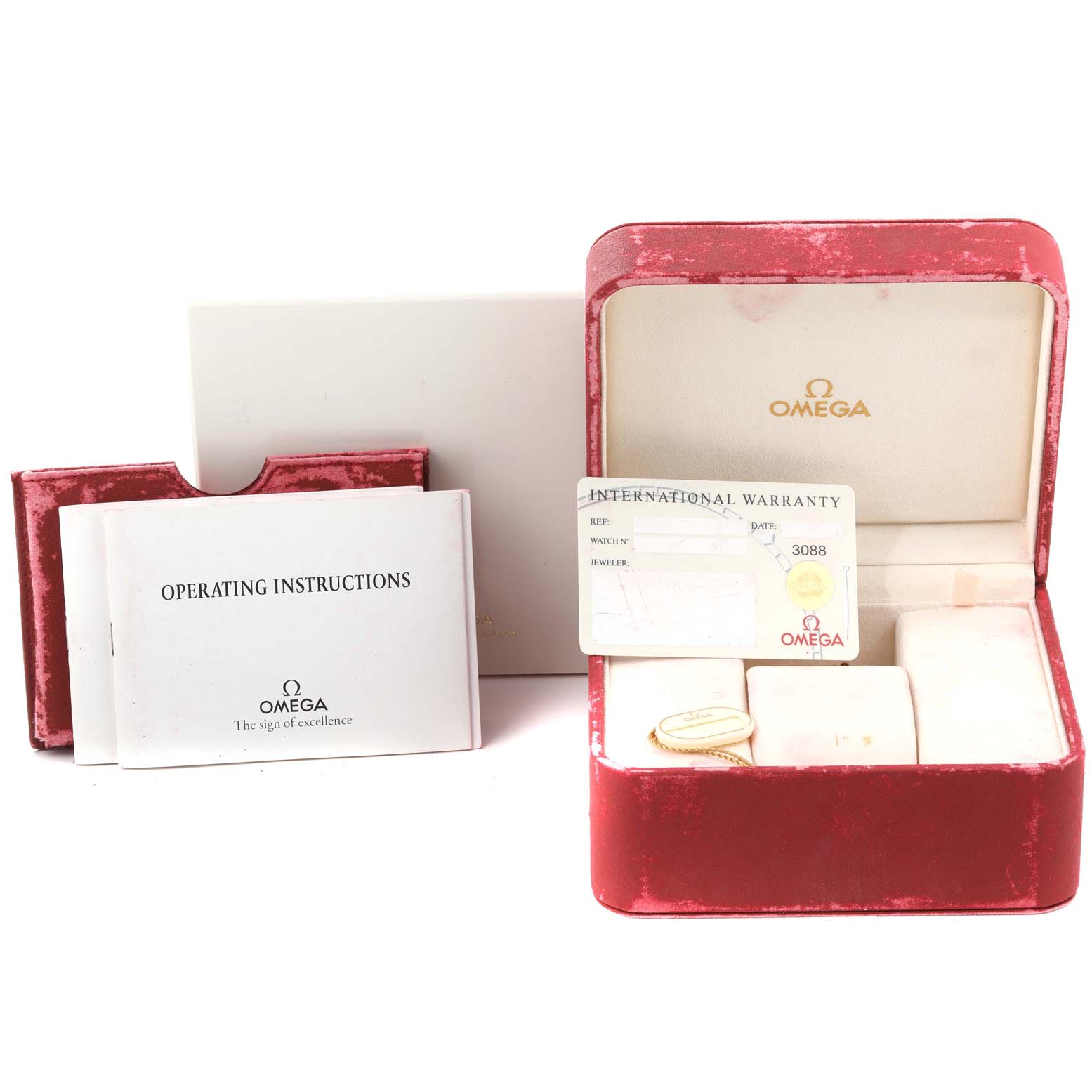 This image displays the Omega Seamaster 2599.80.00 Men
s Stainless Steel Blue Dial 2599.80.00 Men
s Stainless Steel Blue Dial watch box, operating instructions, and international warranty card.