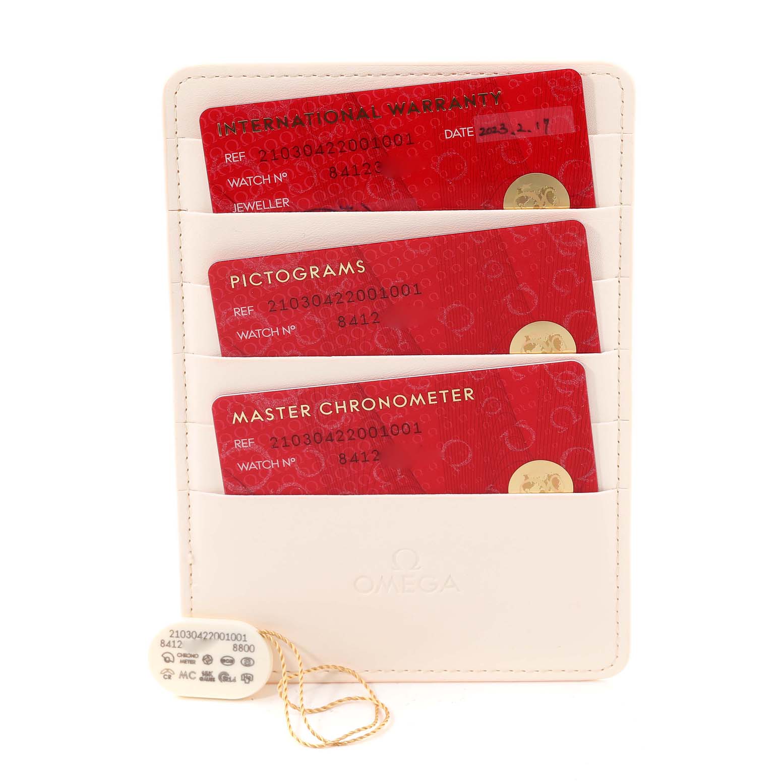 The image shows the warranty cards and accessories for an Omega Seamaster 210.30.42.20.01.001 Men's Stainless Steel Black Dial 210.30.42.20.01.001 Men's Stainless Steel Black Dial model.