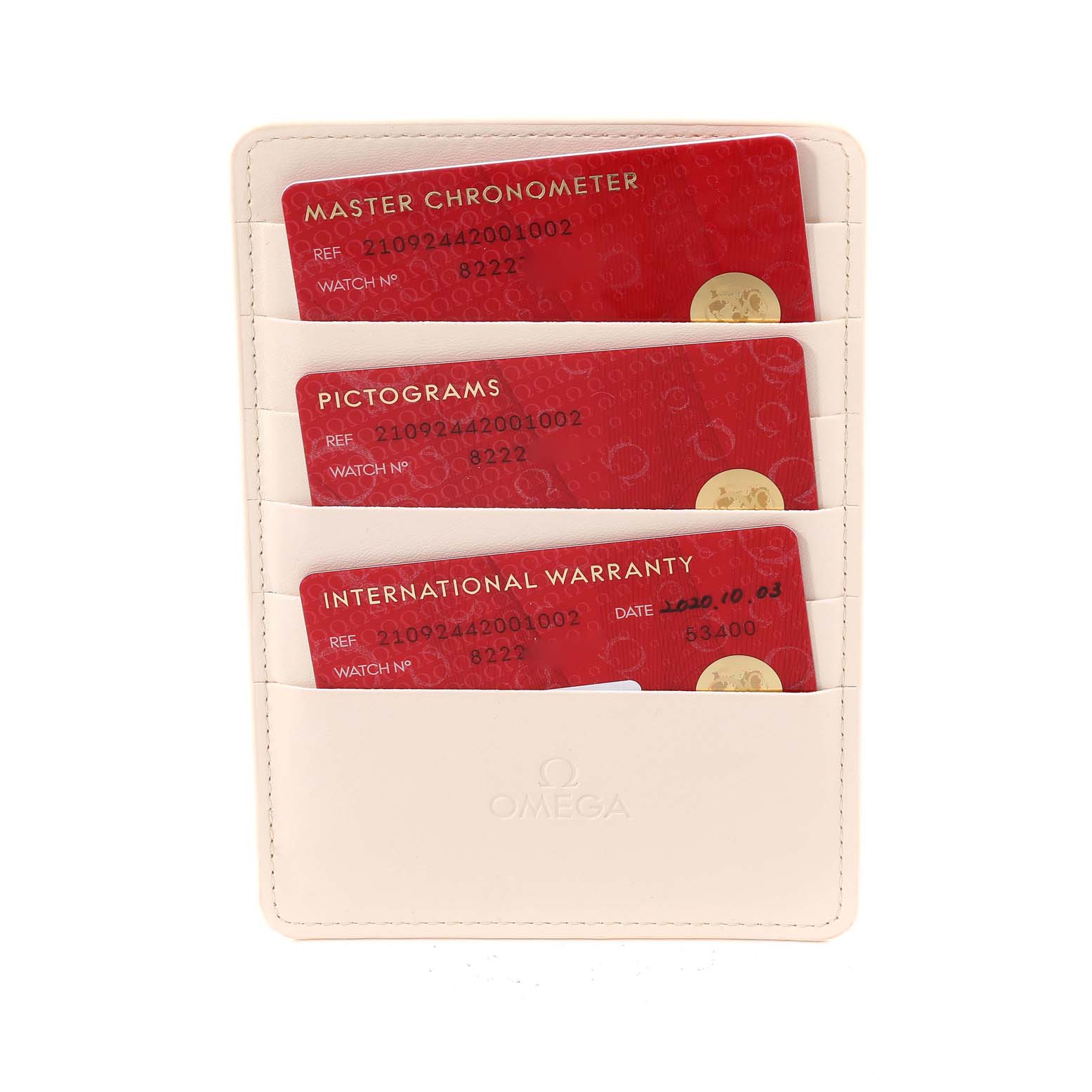 The image shows three red certification cards (Master Chronometer, Pictograms, and International Warranty) for an Omega Seamaster 210.92.44.20.01.002 Men's Ceramic Black Dial 210.92.44.20.01.002 Men's Ceramic Black Dial watch in a beige cardholder.