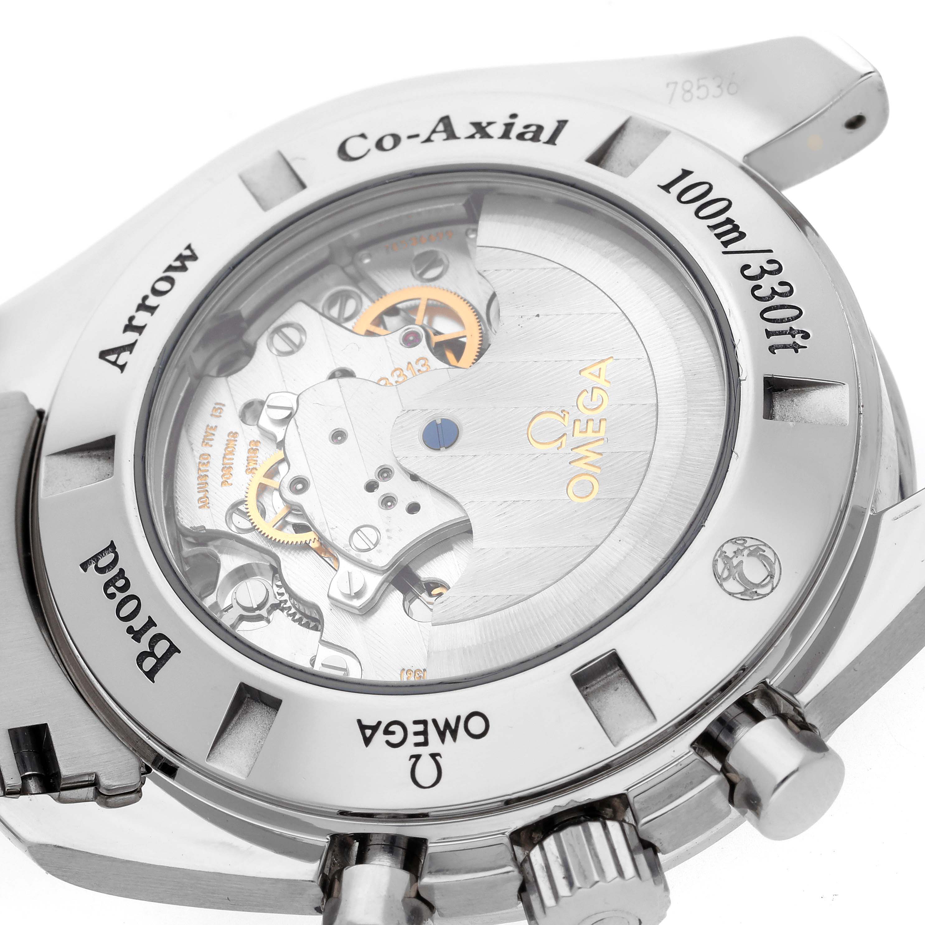 The image shows the case back of an Omega Speedmaster 321.10.44.50.01.001 Men
s Stainless Steel Black Dial 321.10.44.50.01.001 Men
s Stainless Steel Black Dial watch displaying the inner movement and some inscriptions.