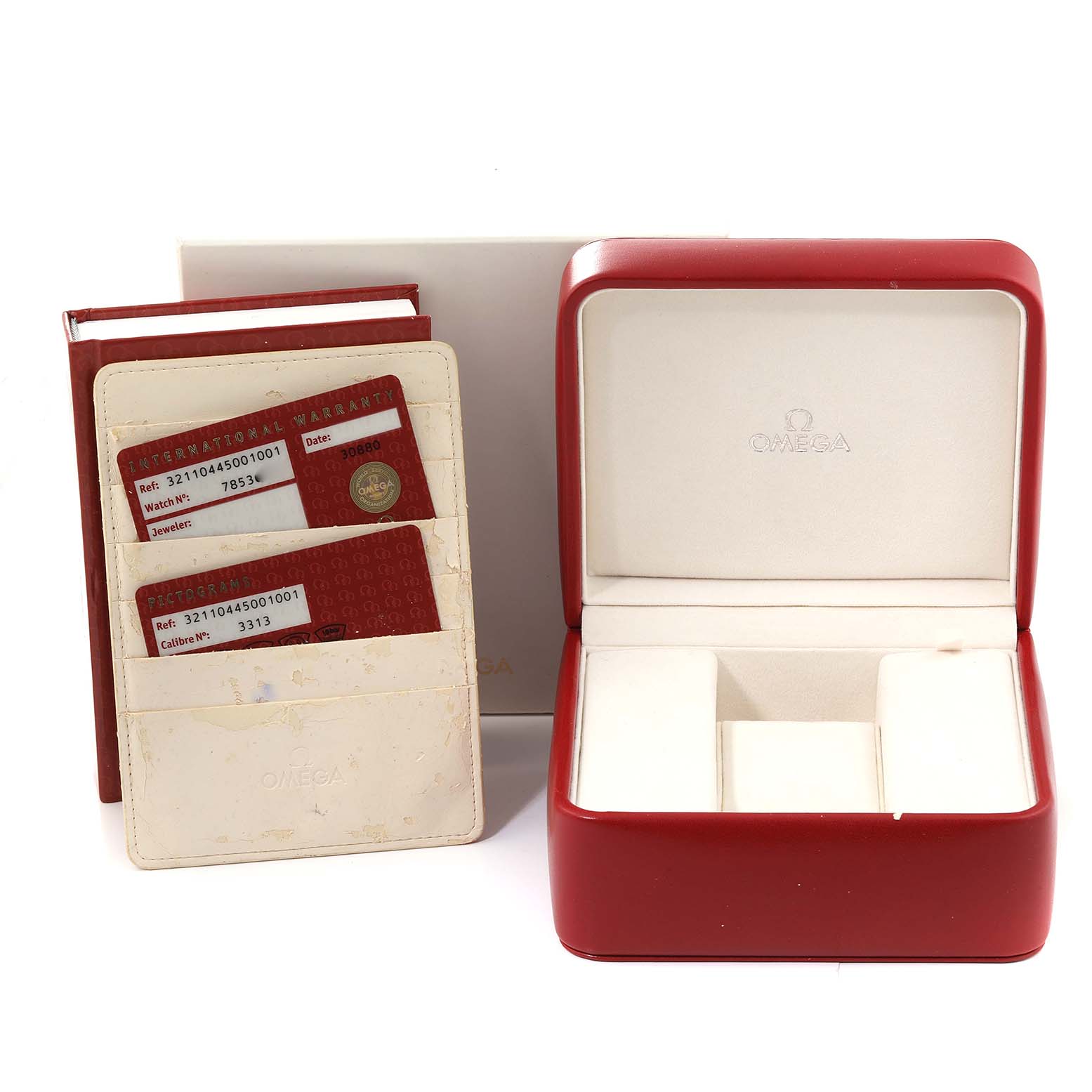 The image shows the packaging and warranty cards for an Omega Speedmaster 321.10.44.50.01.001 Men
s Stainless Steel Black Dial 321.10.44.50.01.001 Men
s Stainless Steel Black Dial watch, including the watch box and card holder.