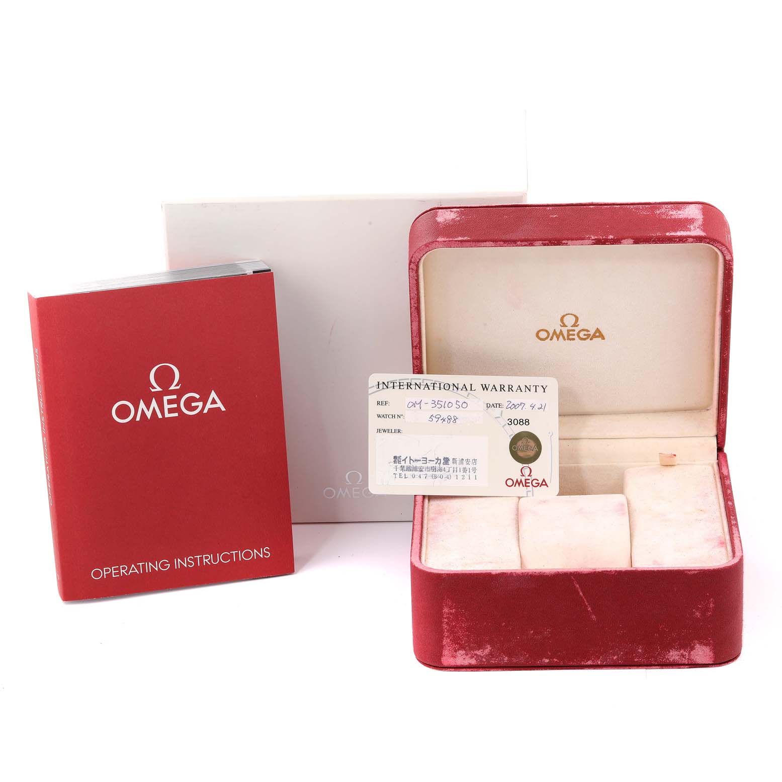 The image displays an Omega Speedmaster 3510.50.00 Men
s Stainless Steel Black Dial 3510.50.00 Men
s Stainless Steel Black Dial box, operating instructions book, and international warranty card from a front angle.