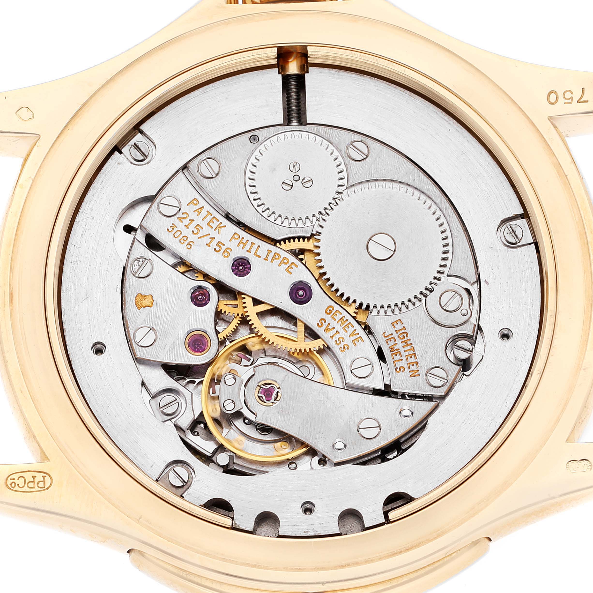 The image shows the intricate movement of a Patek Philippe Calatrava 5134J Men's Yellow Gold White Dial 5134J Men's Yellow Gold White Dial watch viewed from the back.