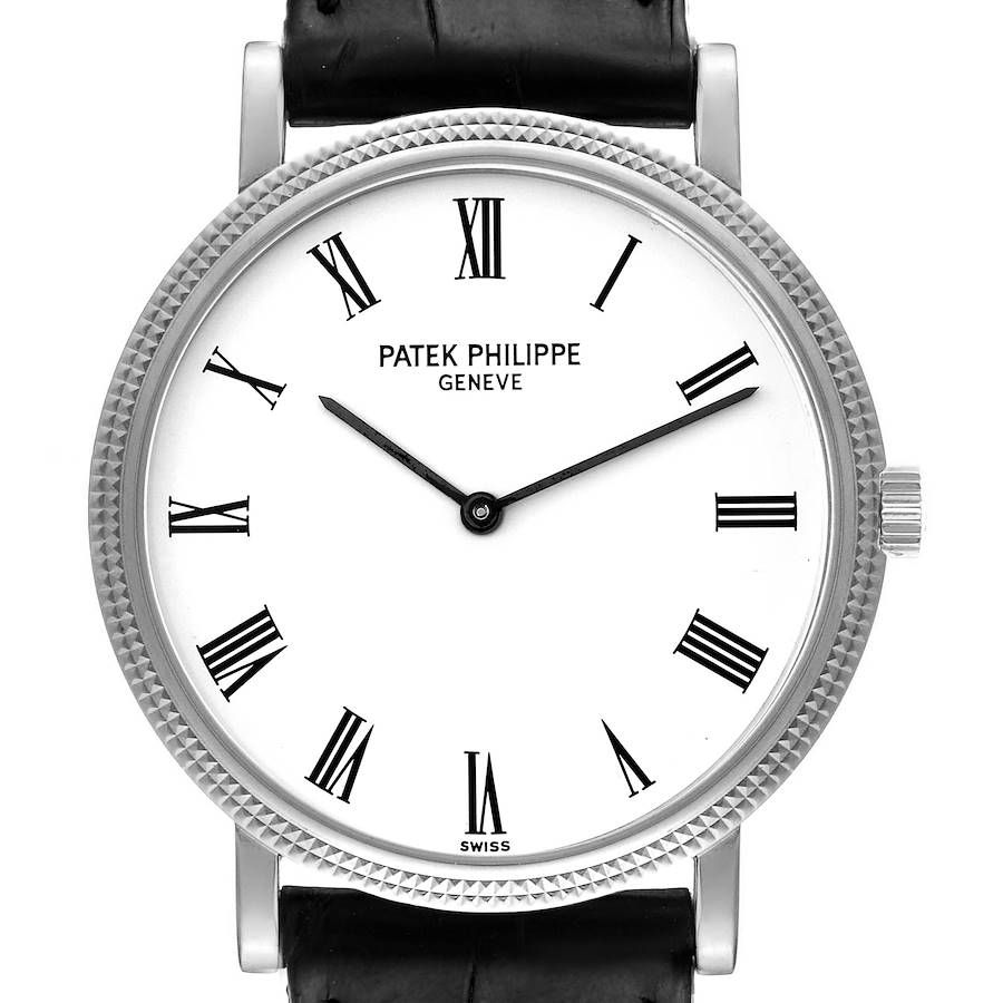 The image shows a front view of a Patek Philippe Calatrava watch, highlighting its Roman numeral dial and black leather strap.