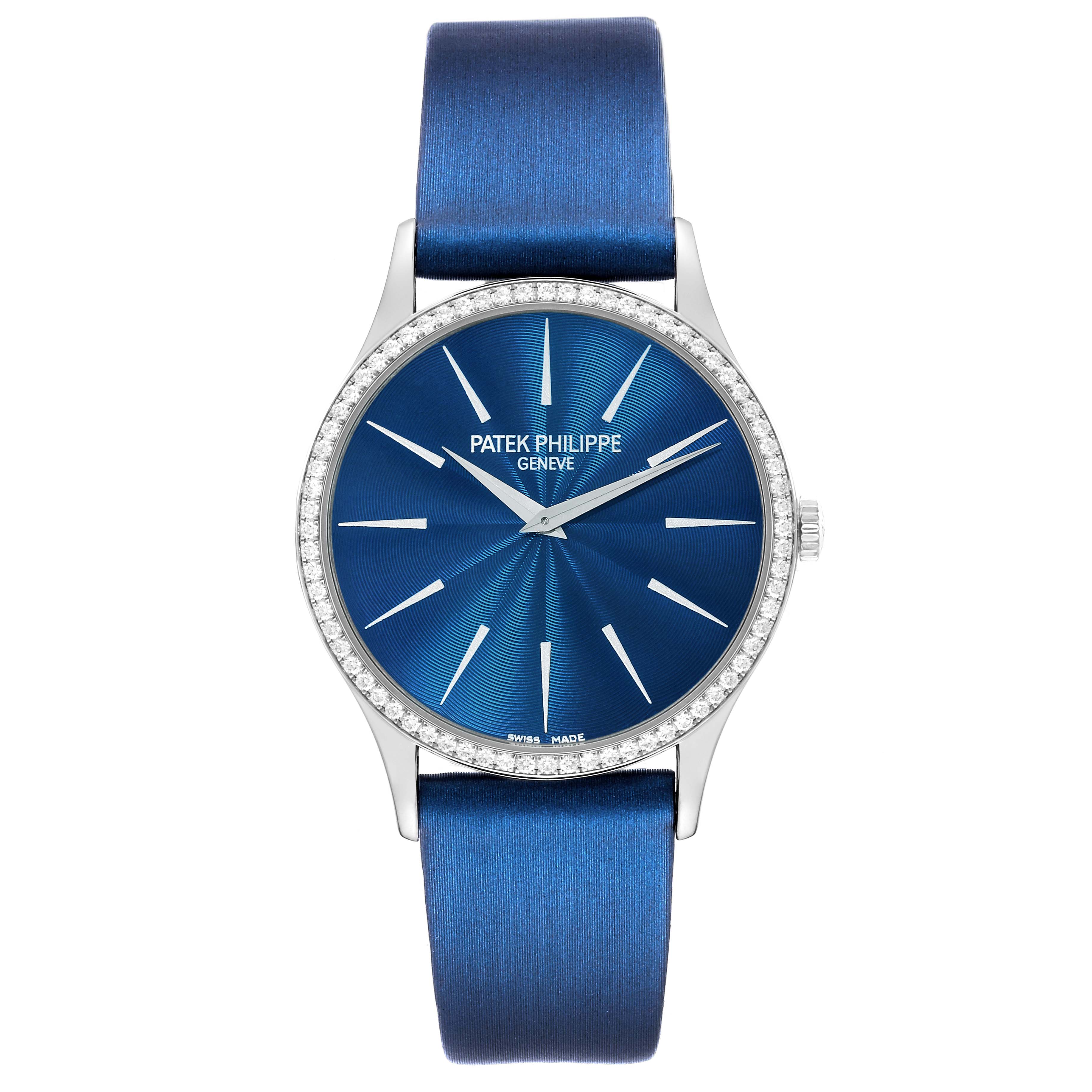 This Patek Philippe Calatrava 4897G-001 Women's White Gold Blue Dial 4897G-001 Women's White Gold Blue Dial watch is shown from a front angle, highlighting its blue dial, silver indices, and blue strap.