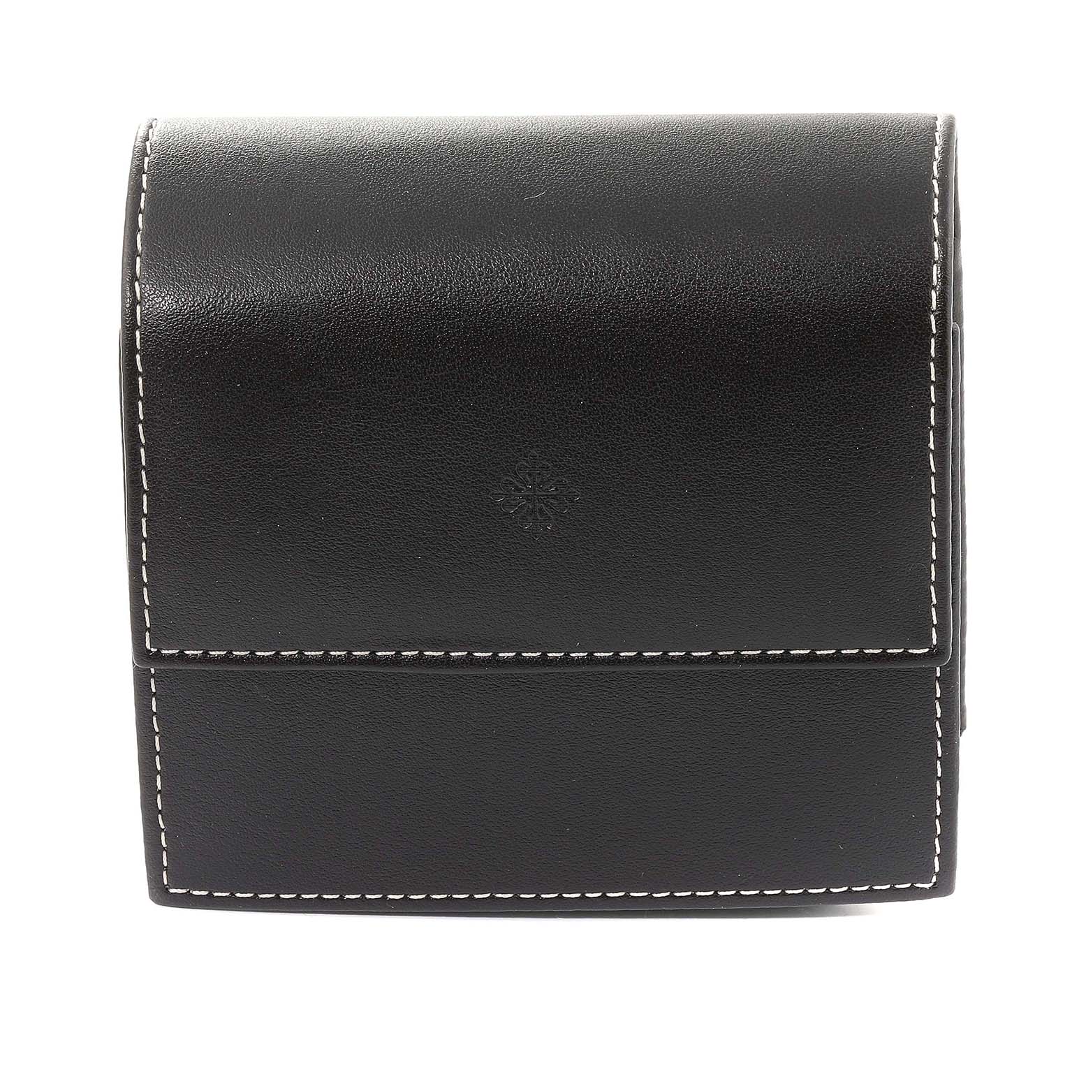 This image shows the Patek Philippe Calatrava 4897G-001 Women's White Gold Blue Dial 4897G-001 Women's White Gold Blue Dial watch's black leather case with white stitching.