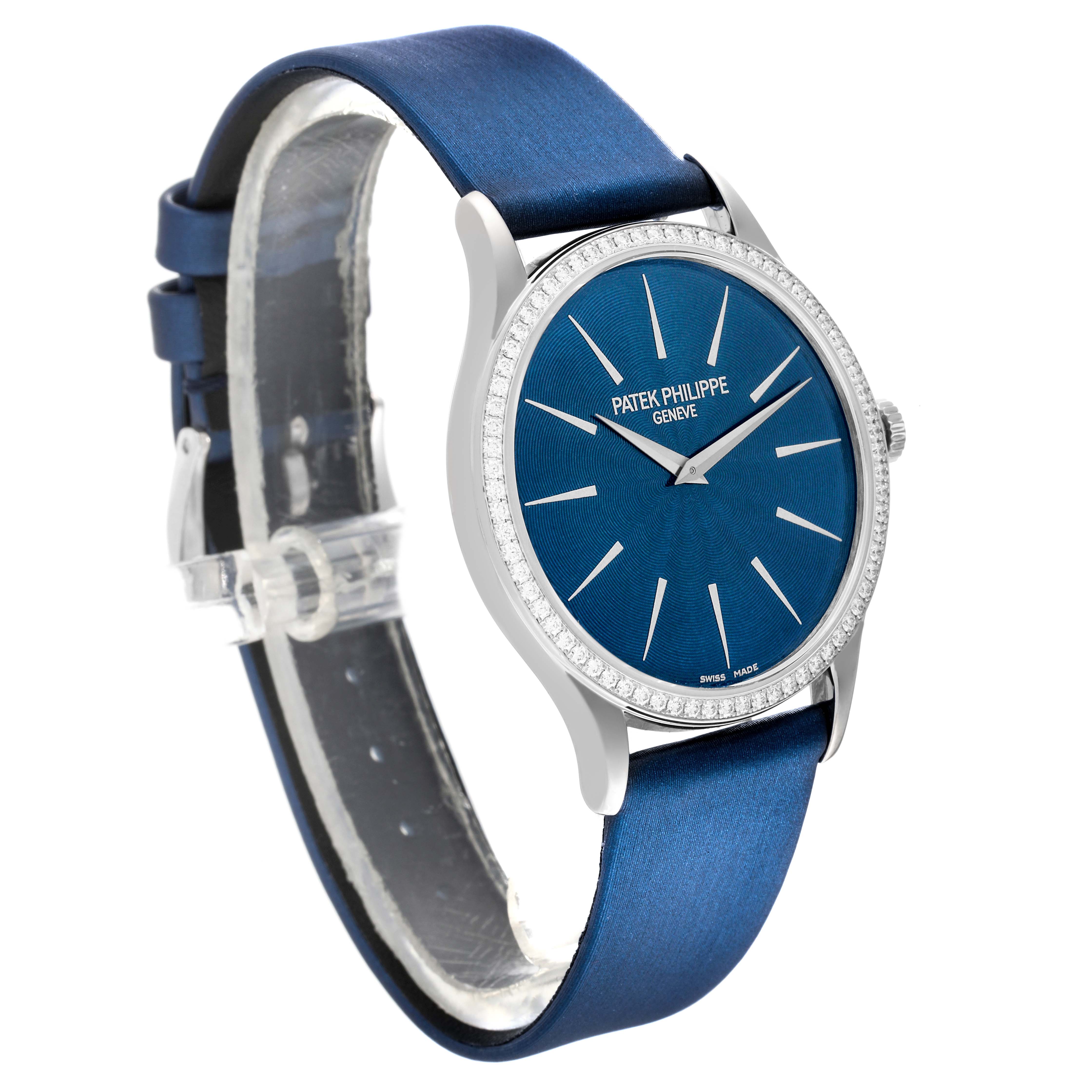 The image shows a Patek Philippe Calatrava 4897G-001 Women's White Gold Blue Dial 4897G-001 Women's White Gold Blue Dial watch at a three-quarter angle, highlighting the face, bezel, and strap.