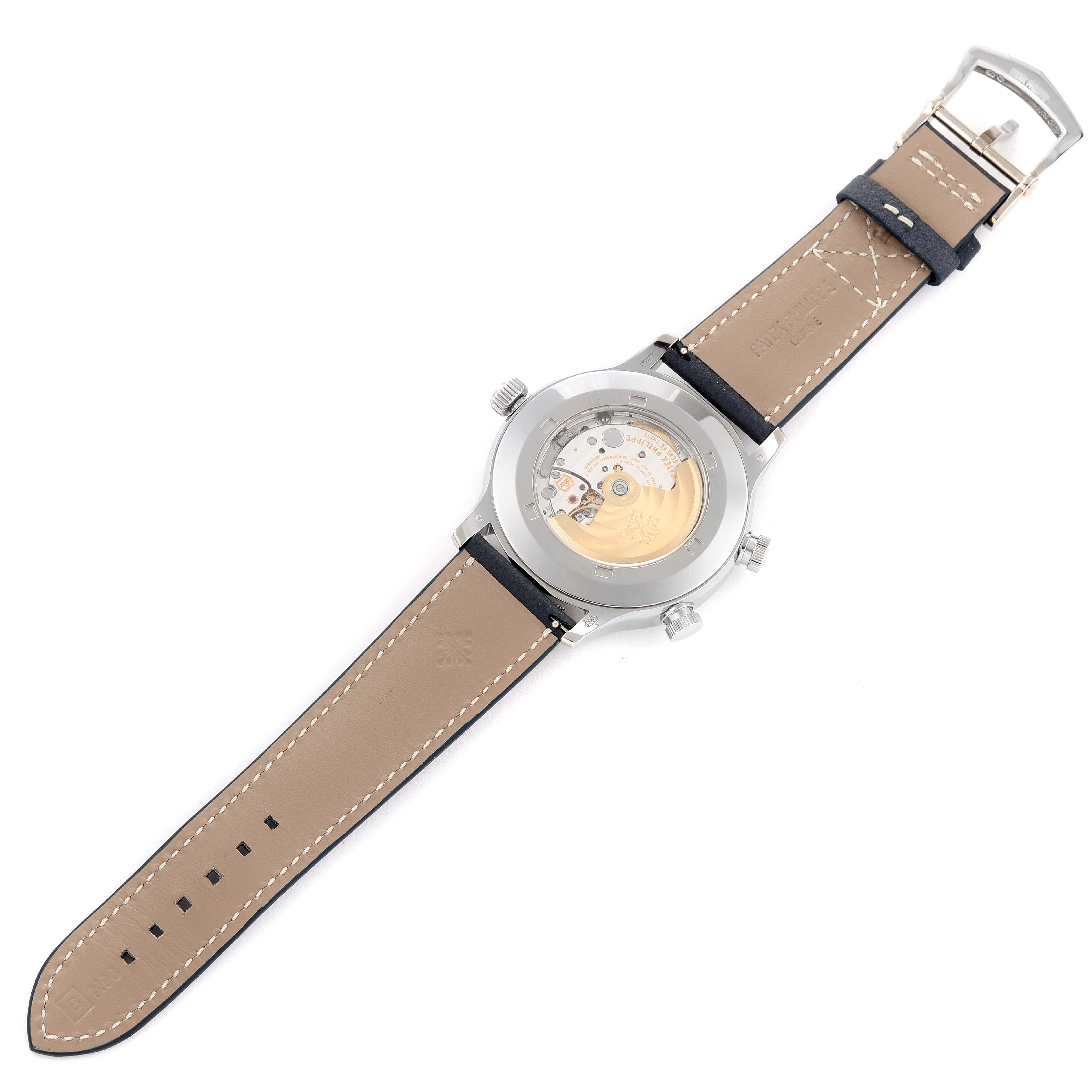 The image shows the back view of a Patek Philippe Calatrava 5524G-001 Men's White Gold Blue Dial 5524G-001 Men's White Gold Blue Dial watch, highlighting its movement and strap.