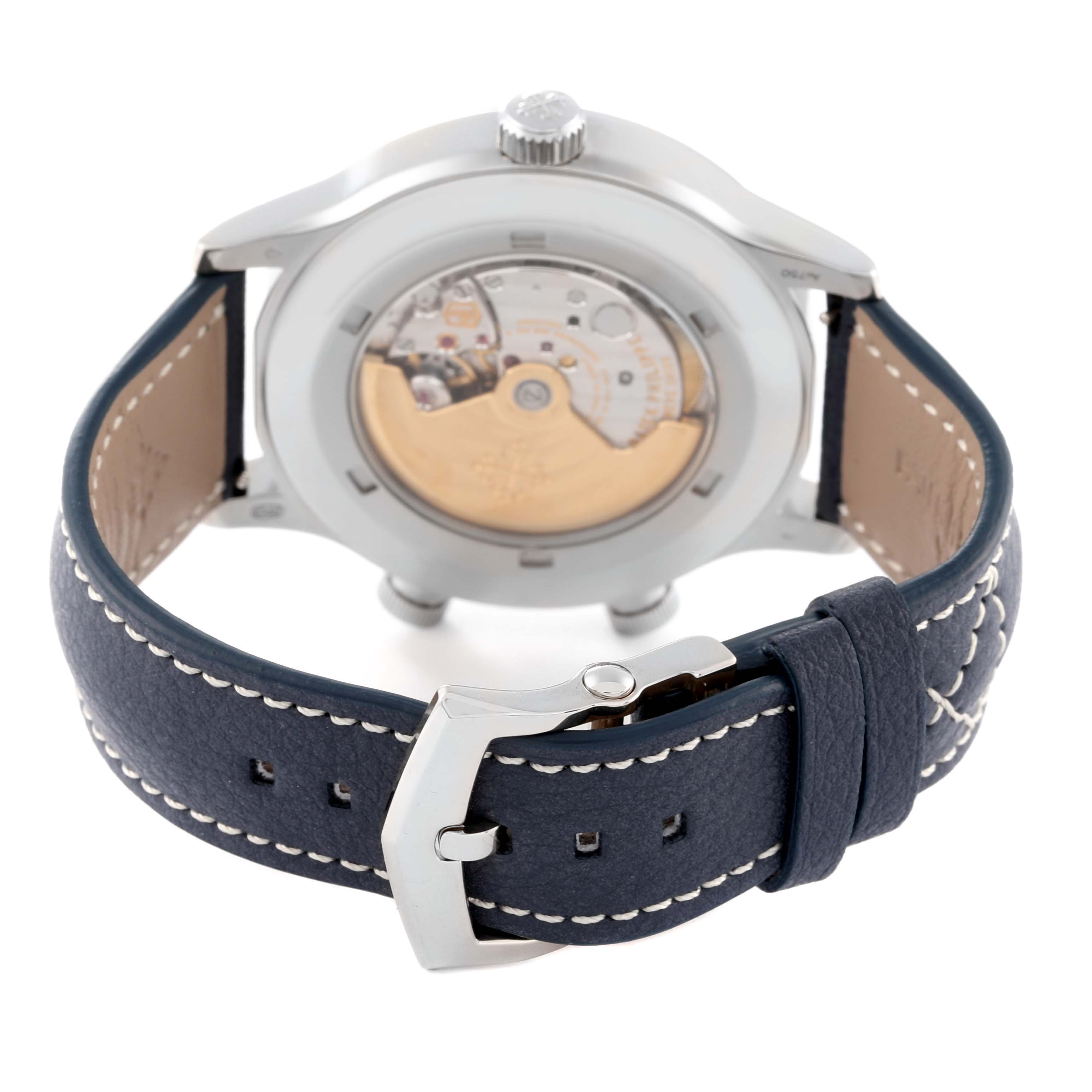 This image shows the back view of the Patek Philippe Calatrava 5524G-001 Men's White Gold Blue Dial 5524G-001 Men's White Gold Blue Dial watch, highlighting its movement and leather strap with stitching.