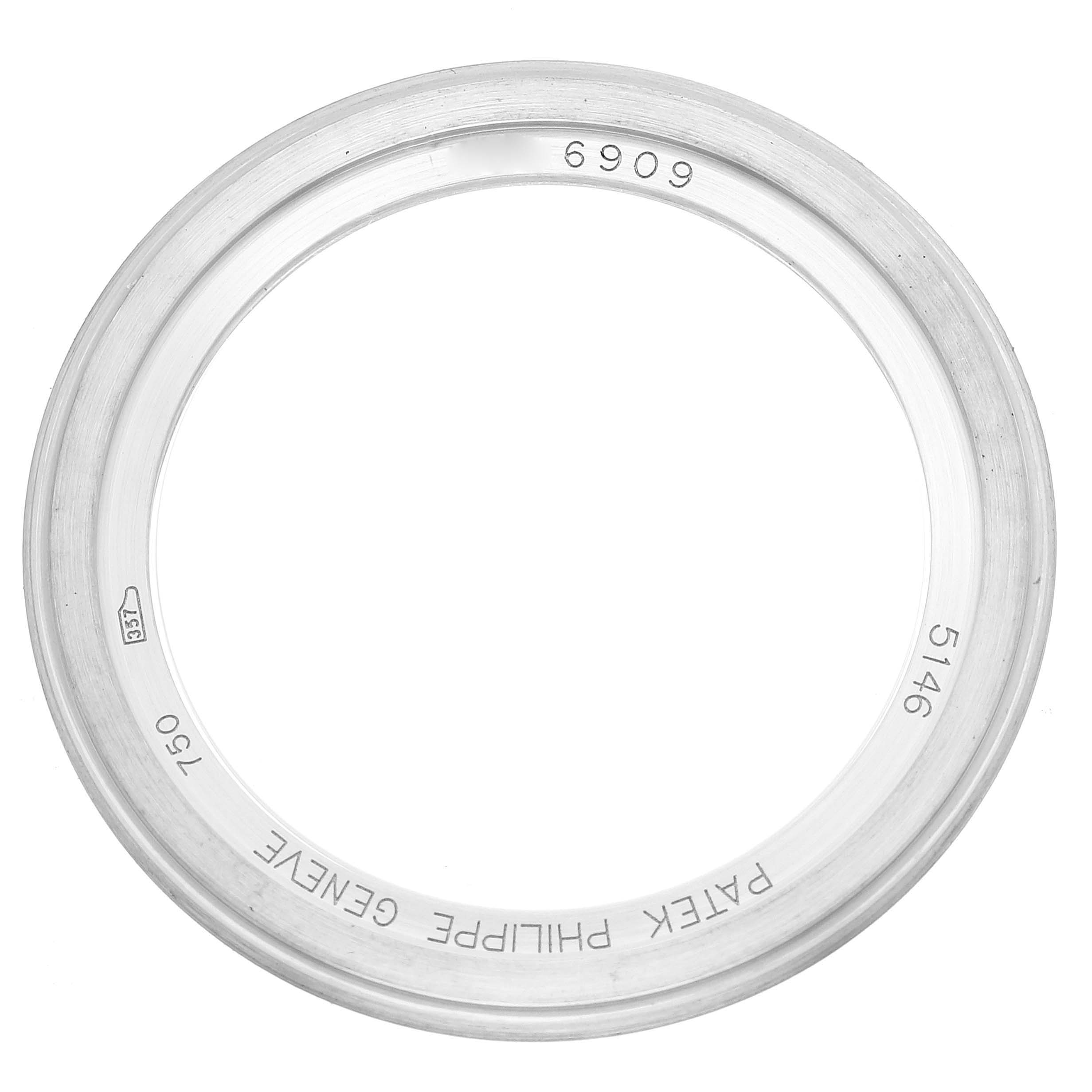 The image shows a Patek Philippe Complications 5146G Men's White Gold Grey Dial 5146G Men's White Gold Grey Dial model watch bezel viewed from the top.