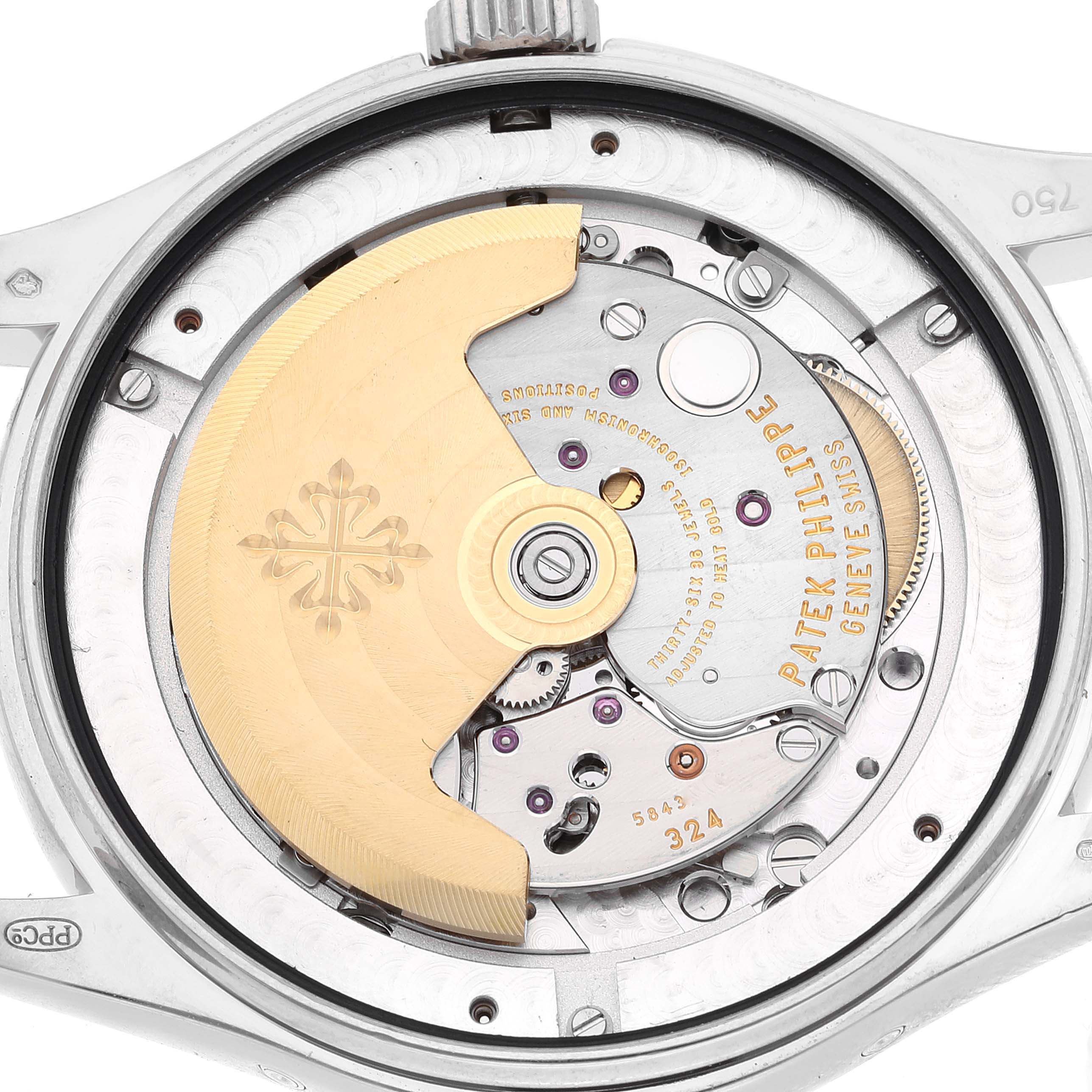 The image shows the back view of the Patek Philippe Complications 5146G Men's White Gold Grey Dial 5146G Men's White Gold Grey Dial model, showcasing its intricate movement and rotor.